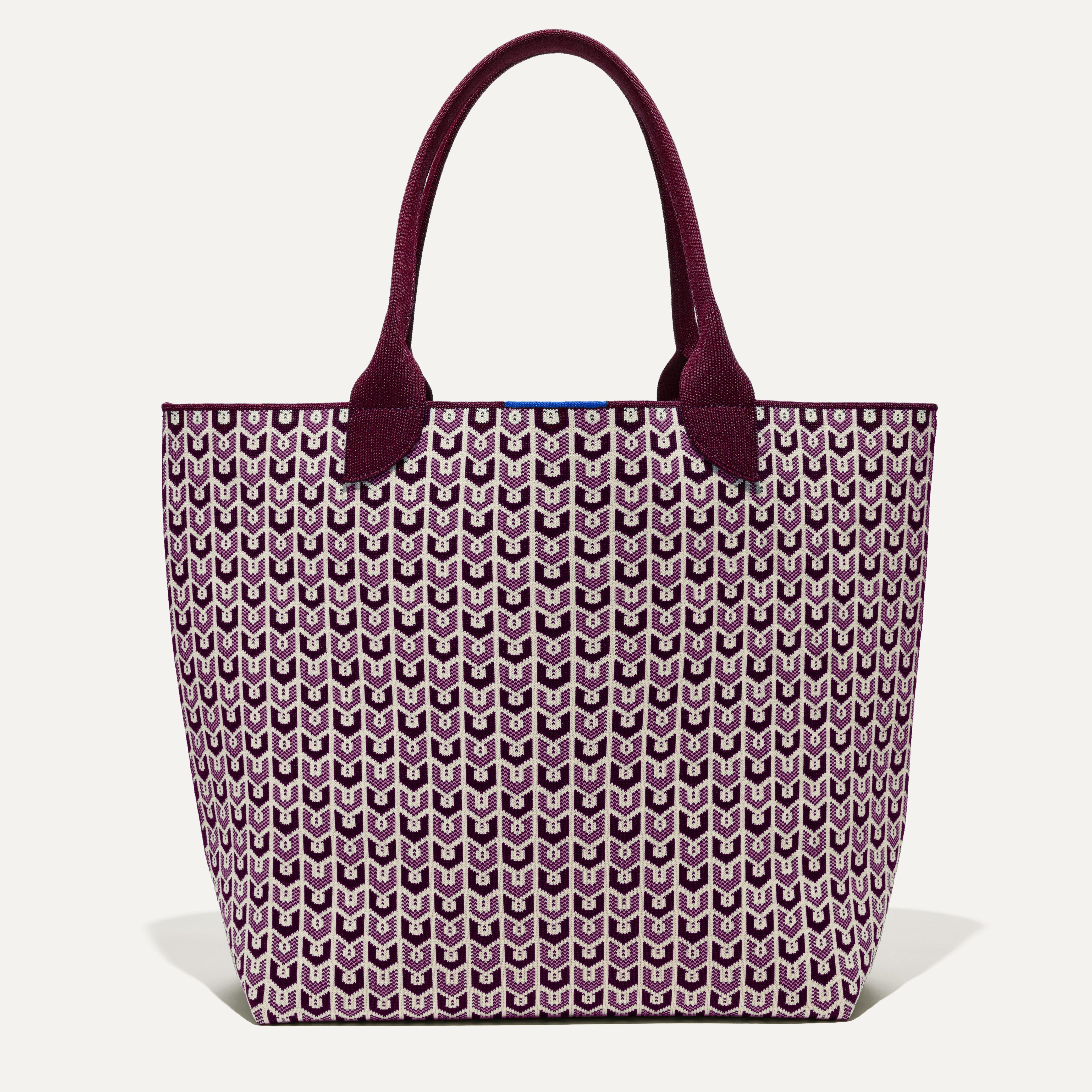 PLP |The Lightweight Tote in Signature Plum shown from the front.