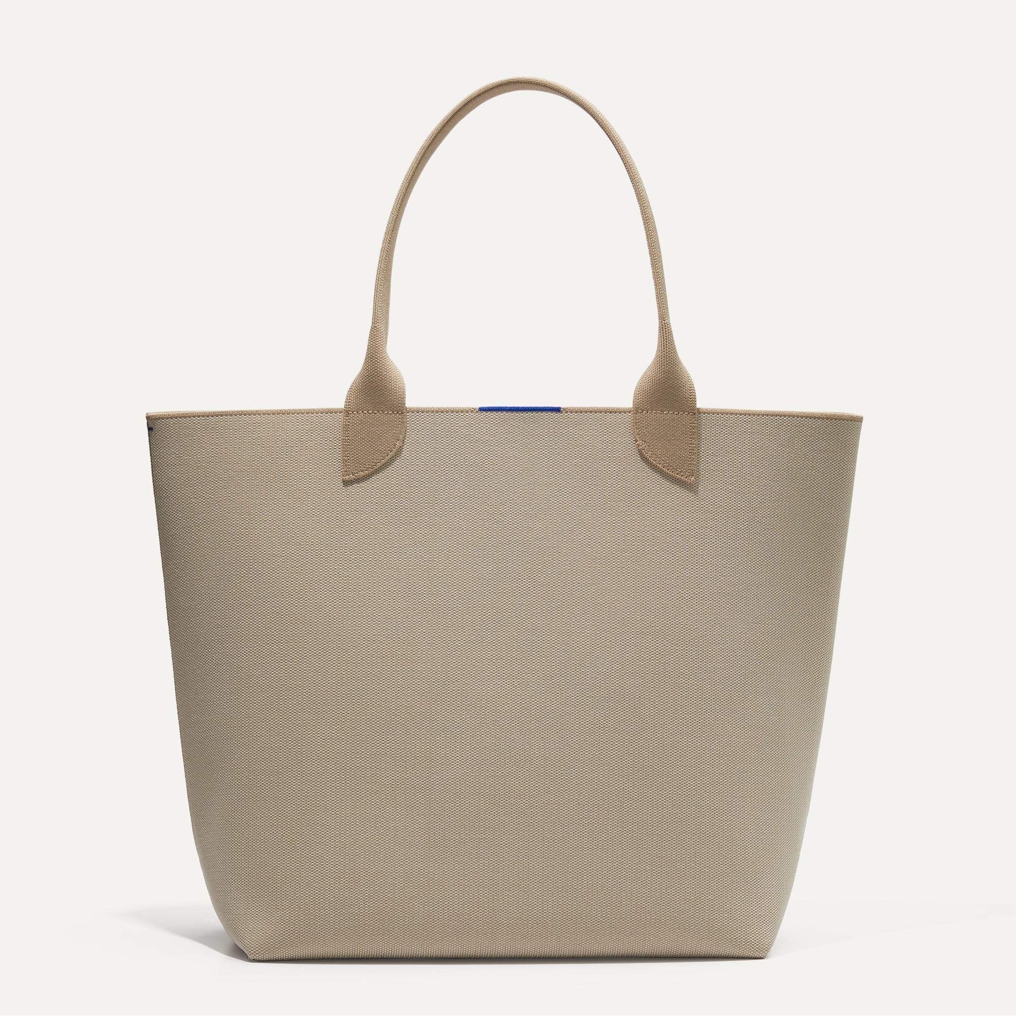 PDP |The Lightweight Tote in Soft Sesame shown from the front.