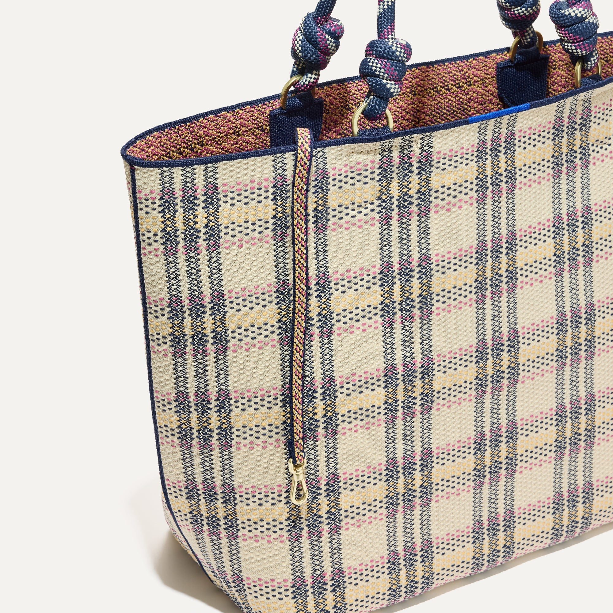 The Lightweight Tote in Spring Plaid shown with its handy key leash.