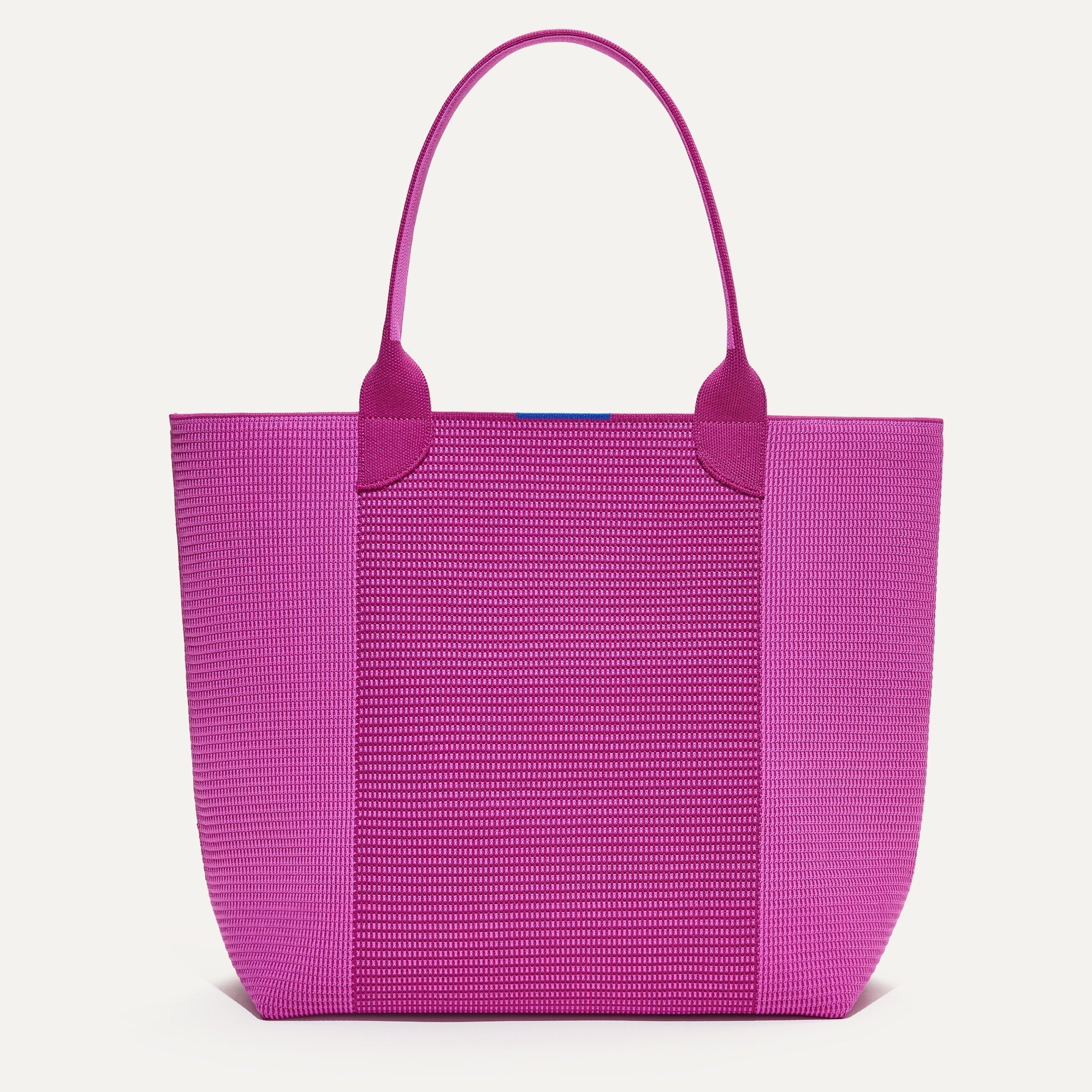 PLP |The Lightweight Tote in Tulip Pink Colorblock shown from the front.