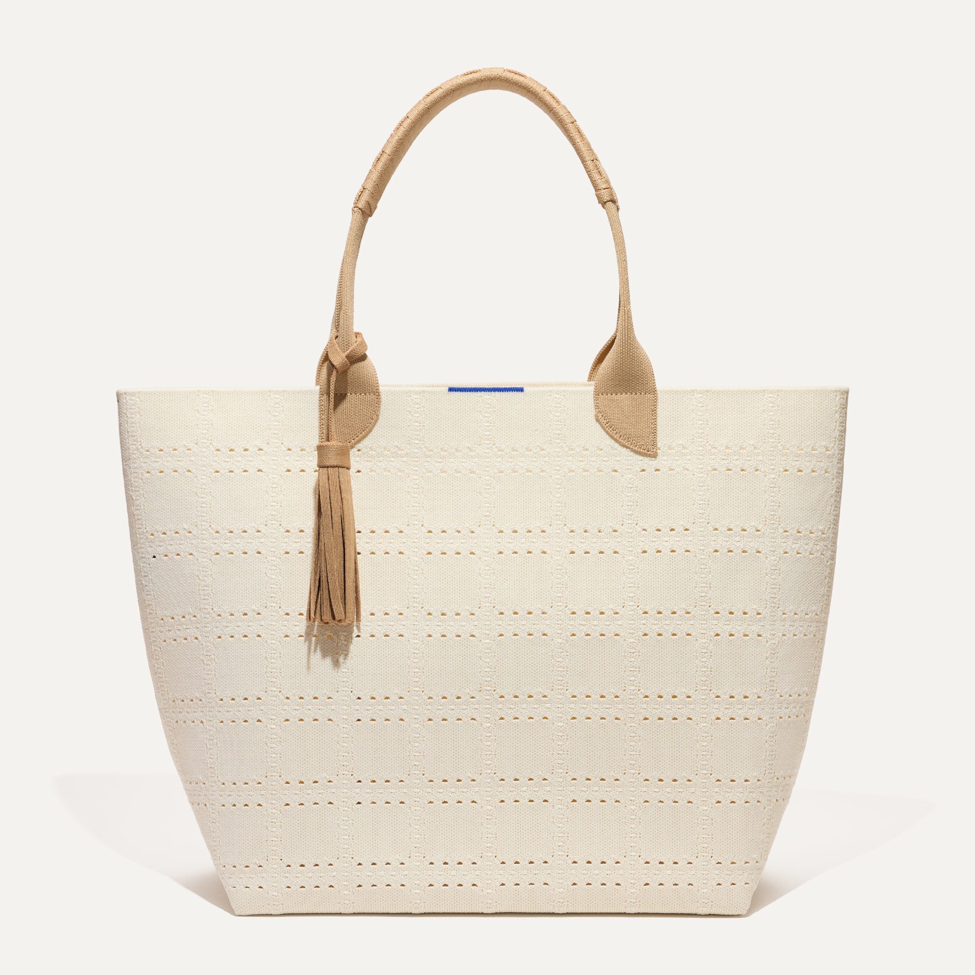 PDP |The Lightweight Tote in Ivory Perf shown from the front.