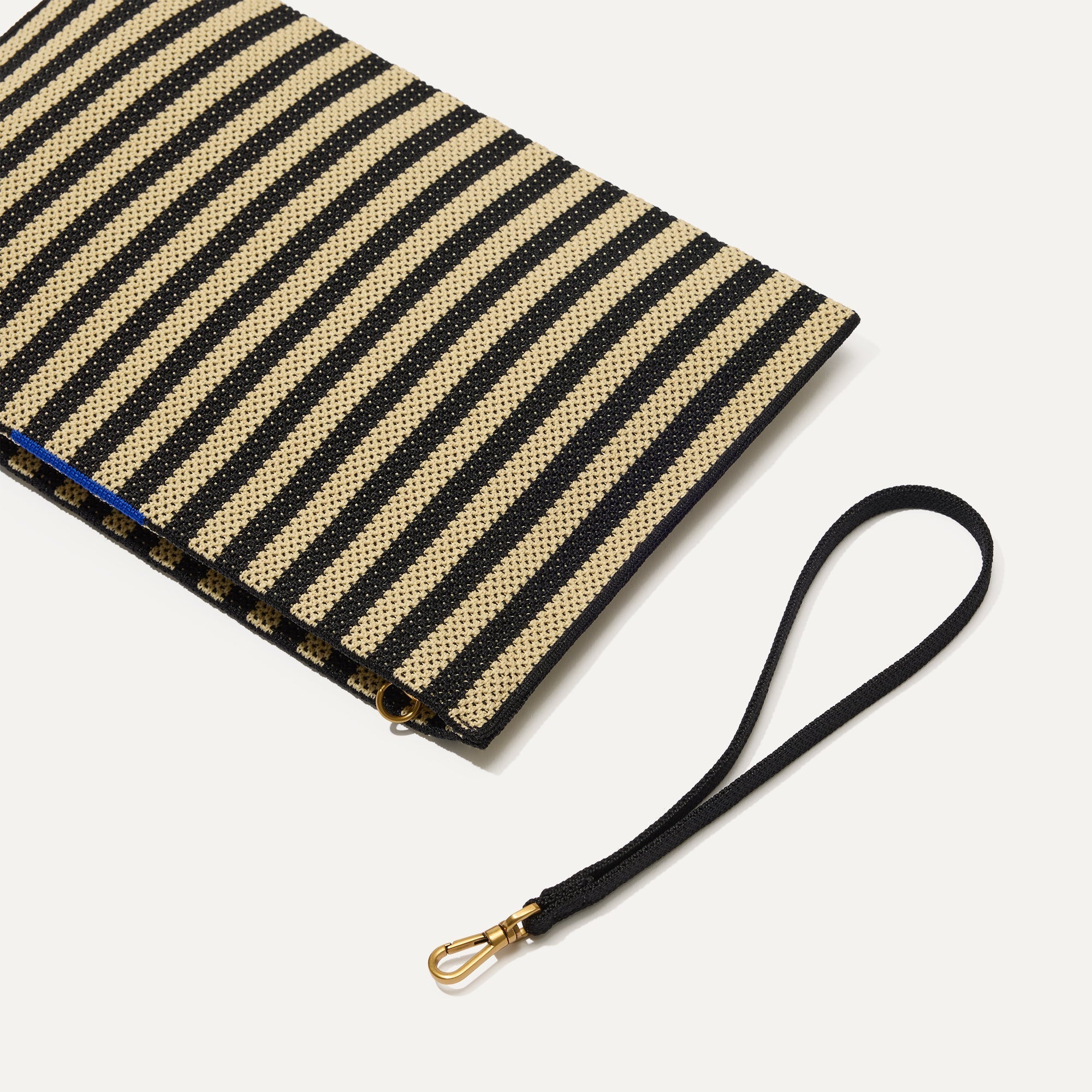A closeup of The Wristlet in Black Tie focusing on the wrist strap.