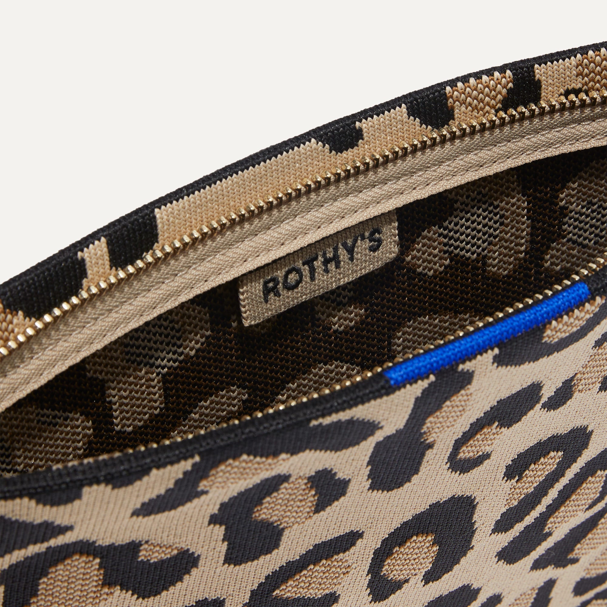 The Wristlet in Desert Cat interior view with Rothy's halo detail.