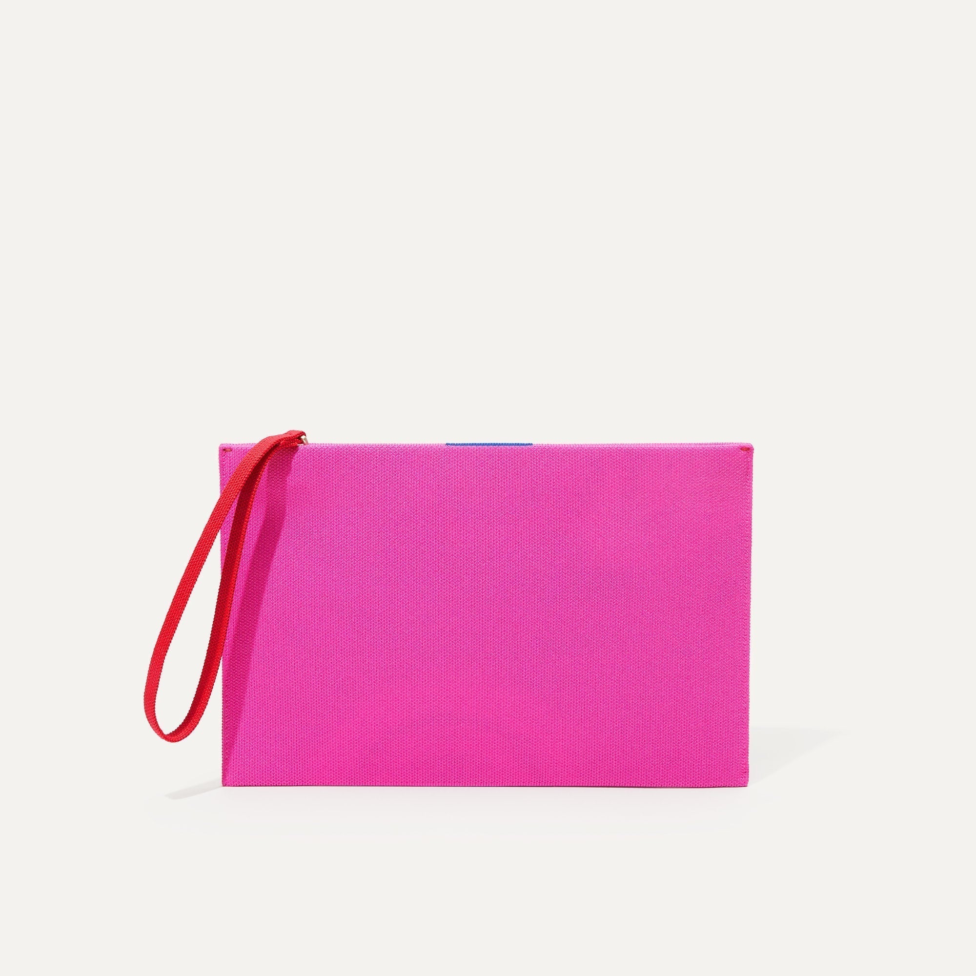 The Wristlet in Dragon Fruit  shown from the front. | PLP