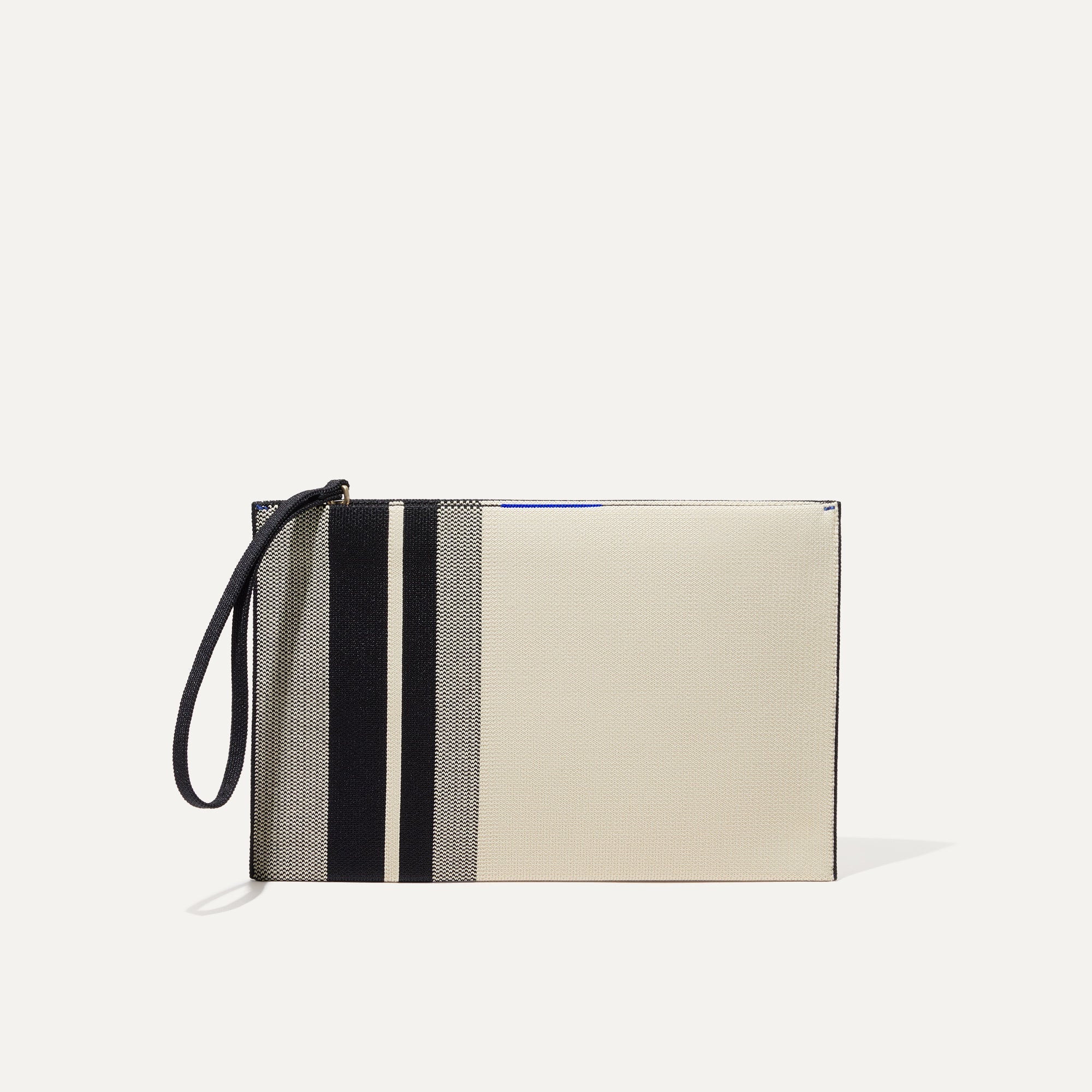 PLP |The Wristlet in Ivory Rugby Stripe shown from the front.