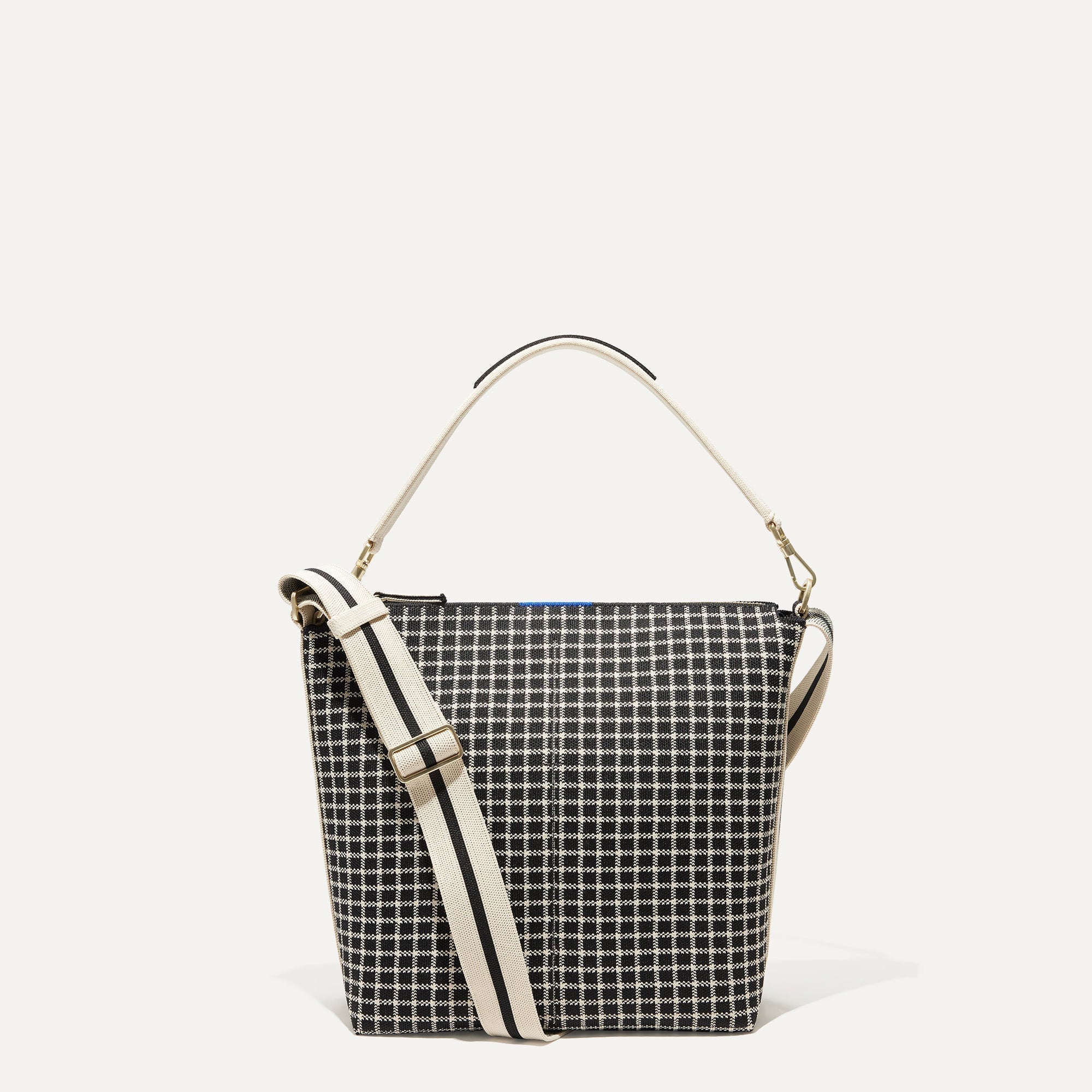 PLP |The Mini Zip Bucket in Black & Ivory Grid shown from the front.