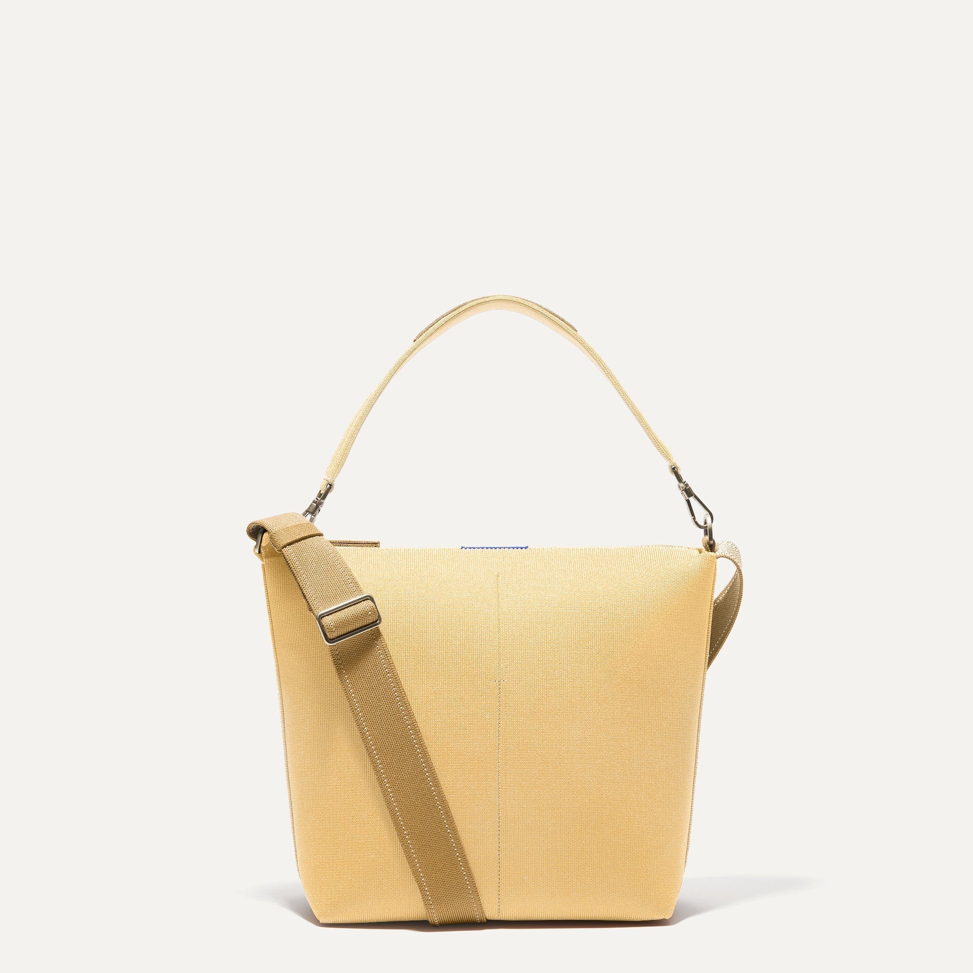 PLP |The Mini Zip Bucket in Butter Yellow shown from the front.
