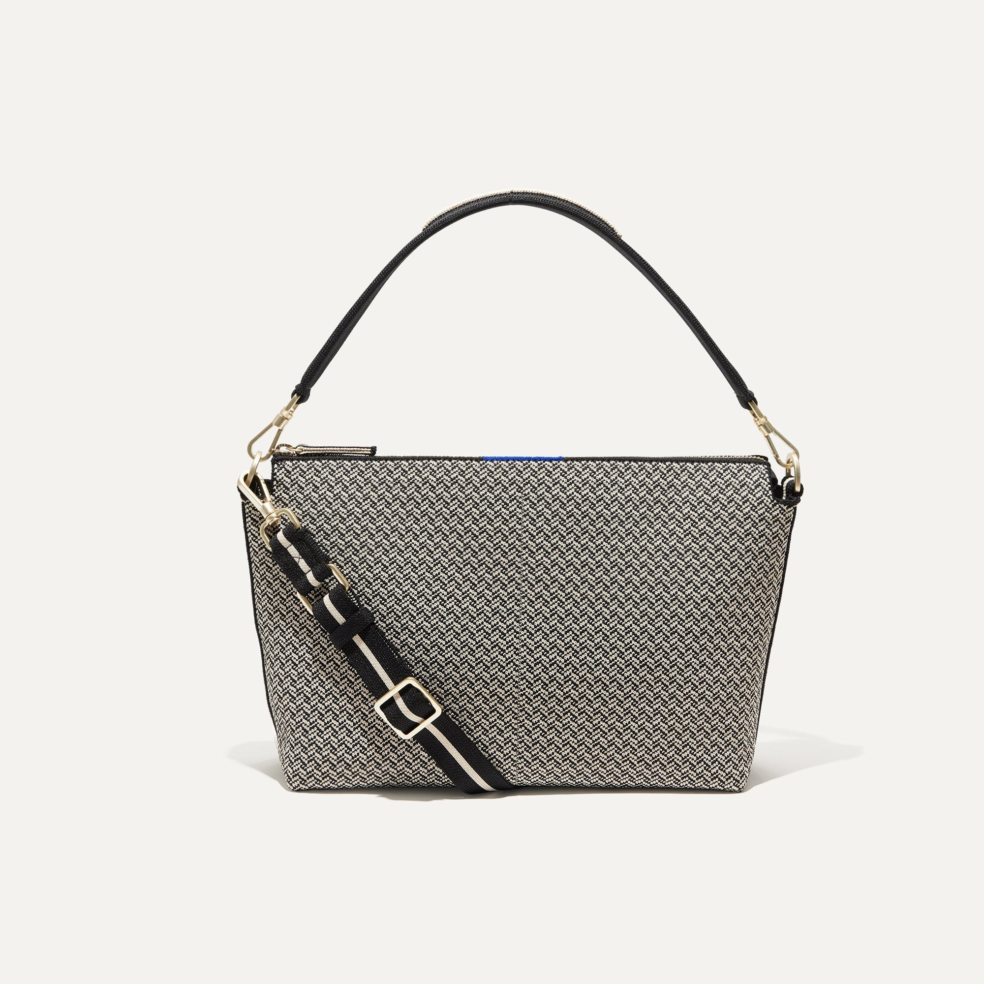 PLP |The Daily Crossbody Bag in Black Mist Herringbone shown from the front.