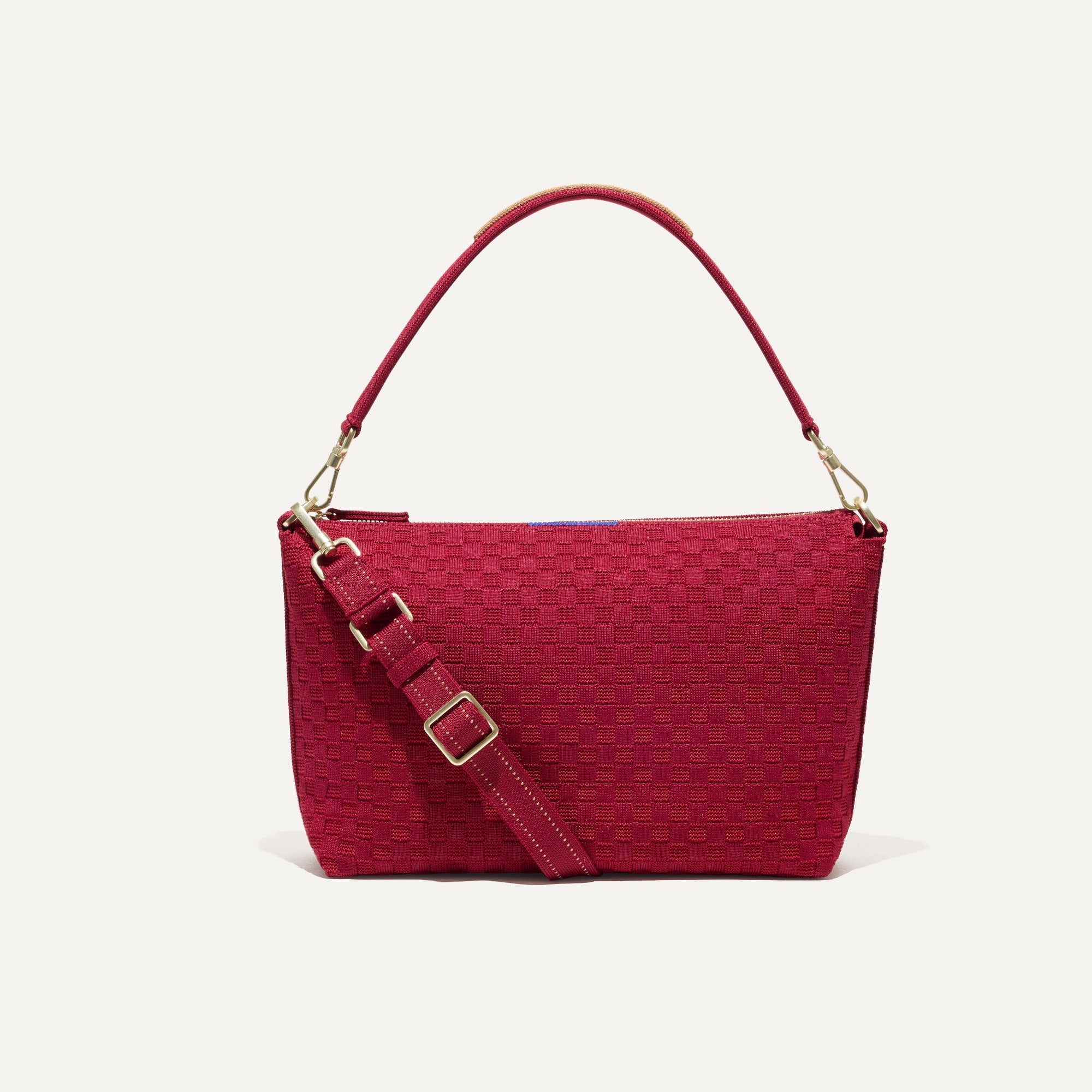 PLP |The Daily Crossbody Bag in Cranberry shown from the front.