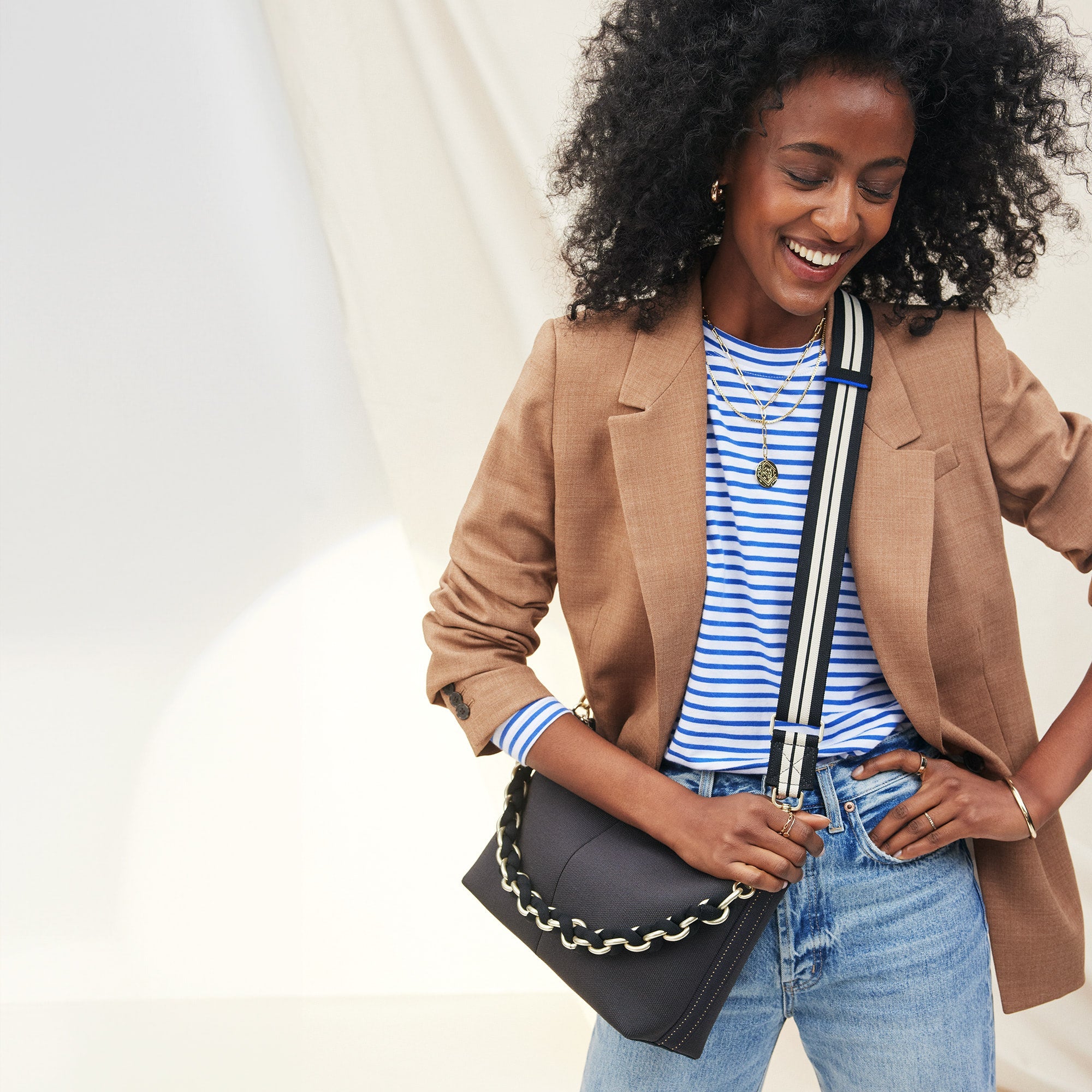 hover | Model wearing The Shoulder Strap in Black Chain paired with The Daily Crossbody.