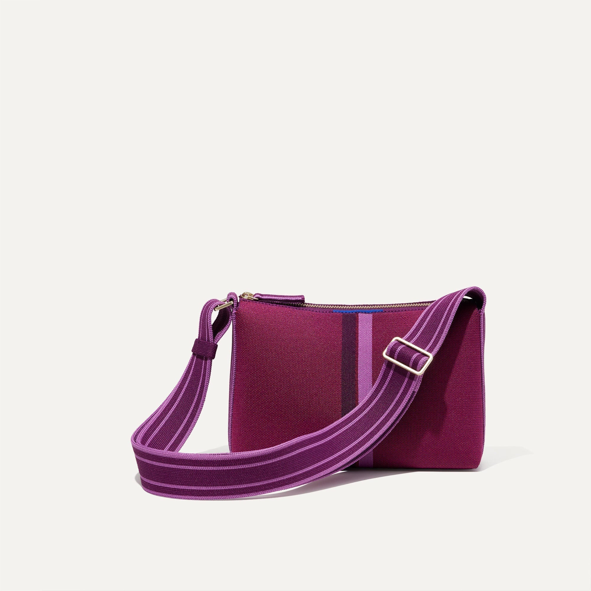 PLP |The Casual Crossbody in Plum Stripe, shown from the front.