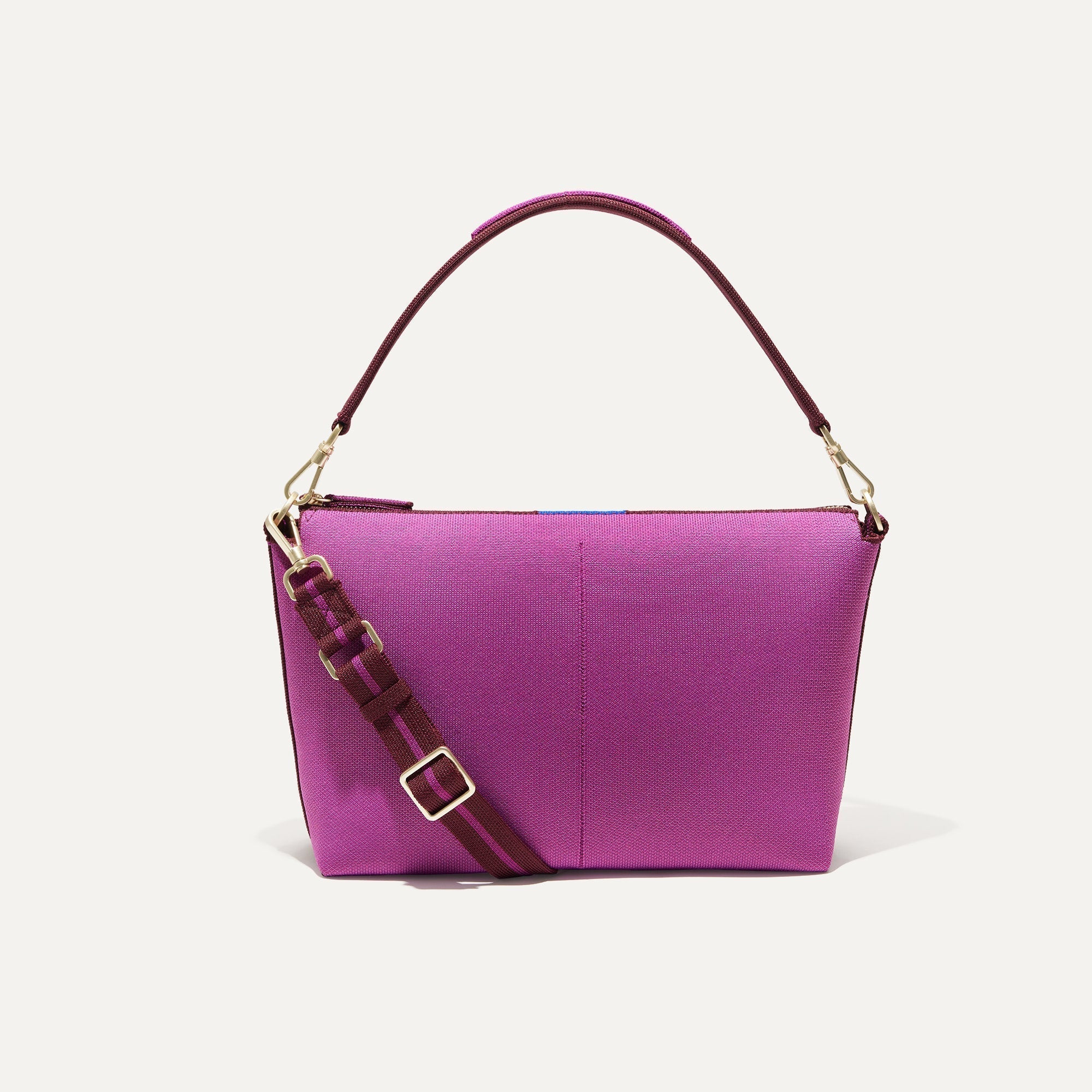 PLP |The Daily Crossbody Bag in Soft Orchid shown from the front.