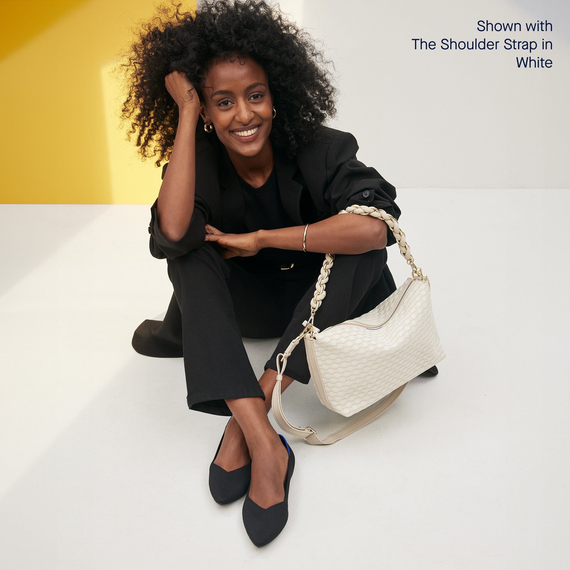 The Daily Crossbody in White Sand paired with The Shoulder Strap in White.