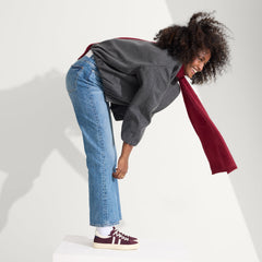 hover | Model wearing The RS02 Sneaker Burgundy Blitz.