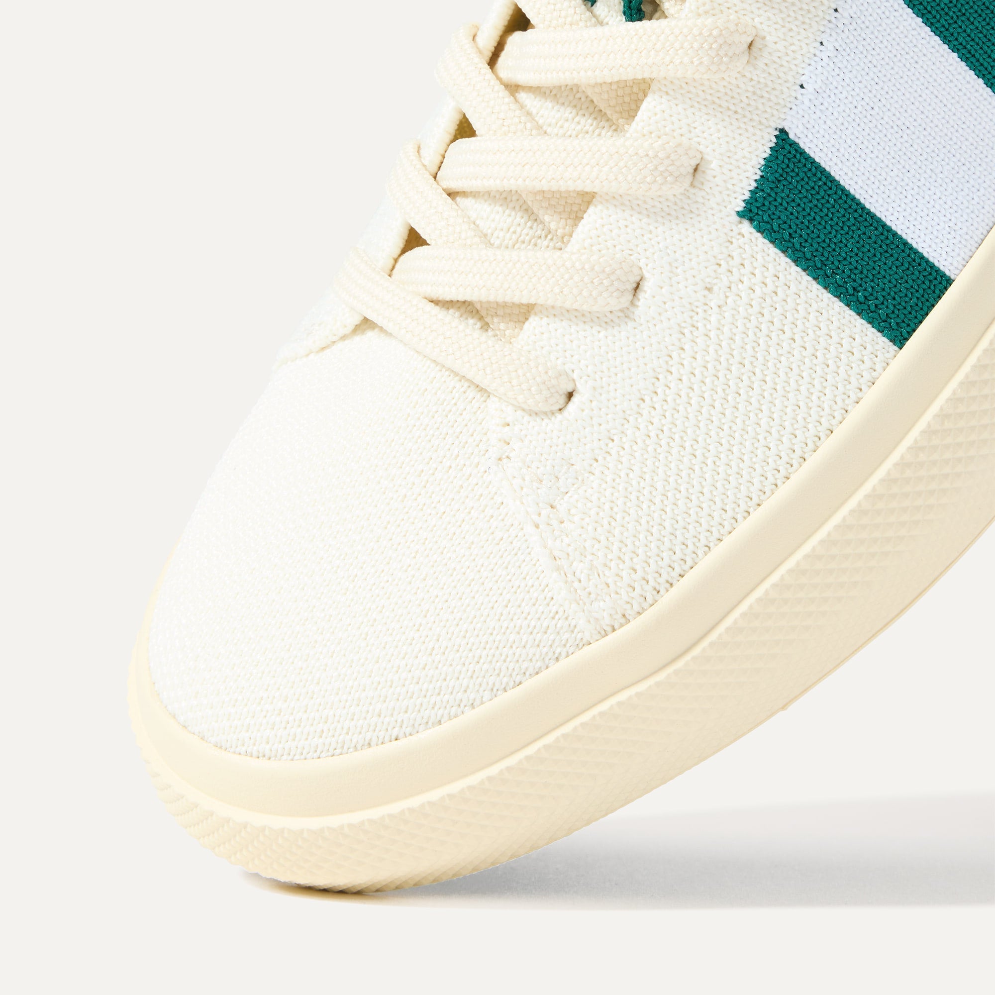 Close up of the toe and stitching details of The RS02 Sneaker in Kelly.