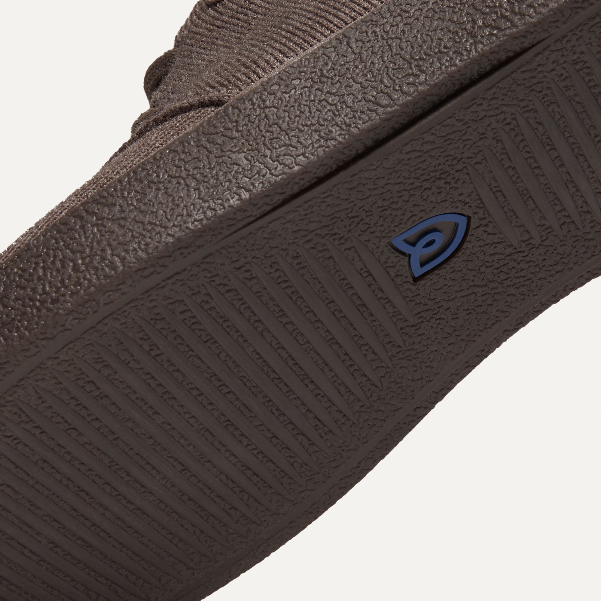 Outsole of The Monty in Timber Brown shown from below, in diagonal view. 