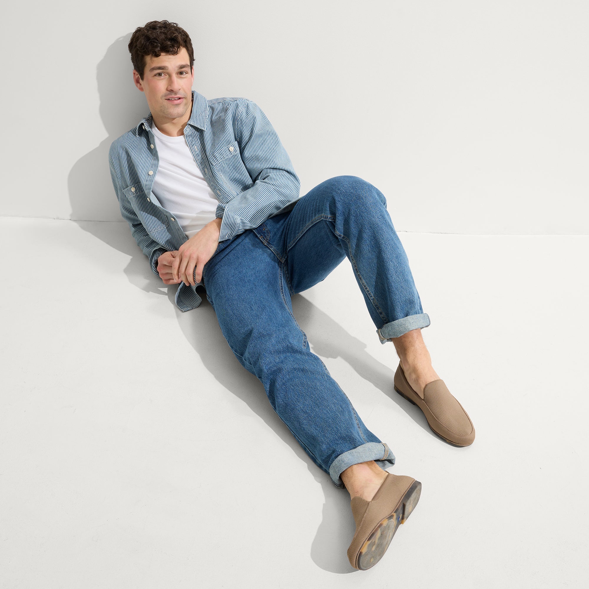 Alternate view of a model wearing The Ravello Loafer in Faded Brown.