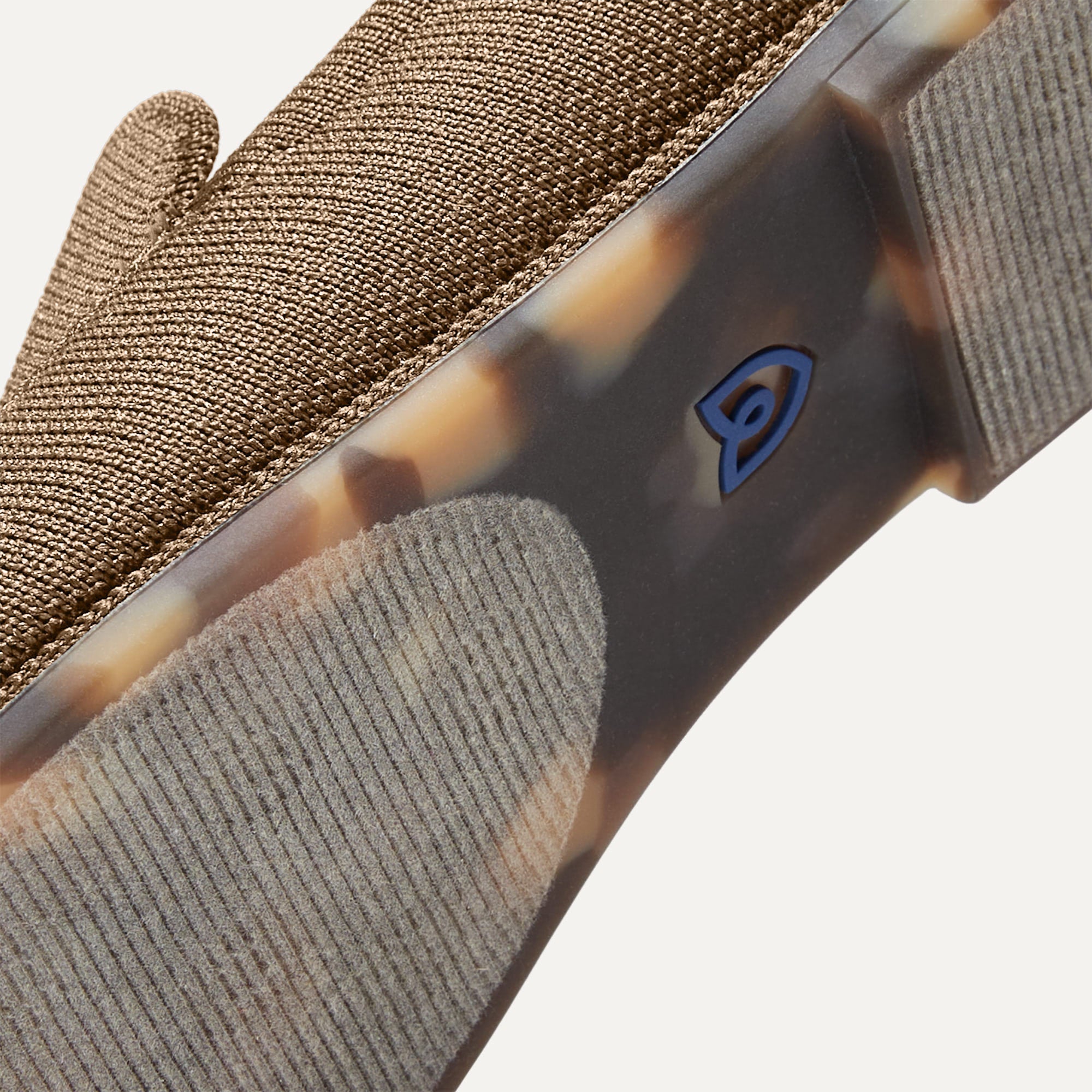 Outsole of The Ravello Loafer in Faded Brown shown from below, in diagonal view.