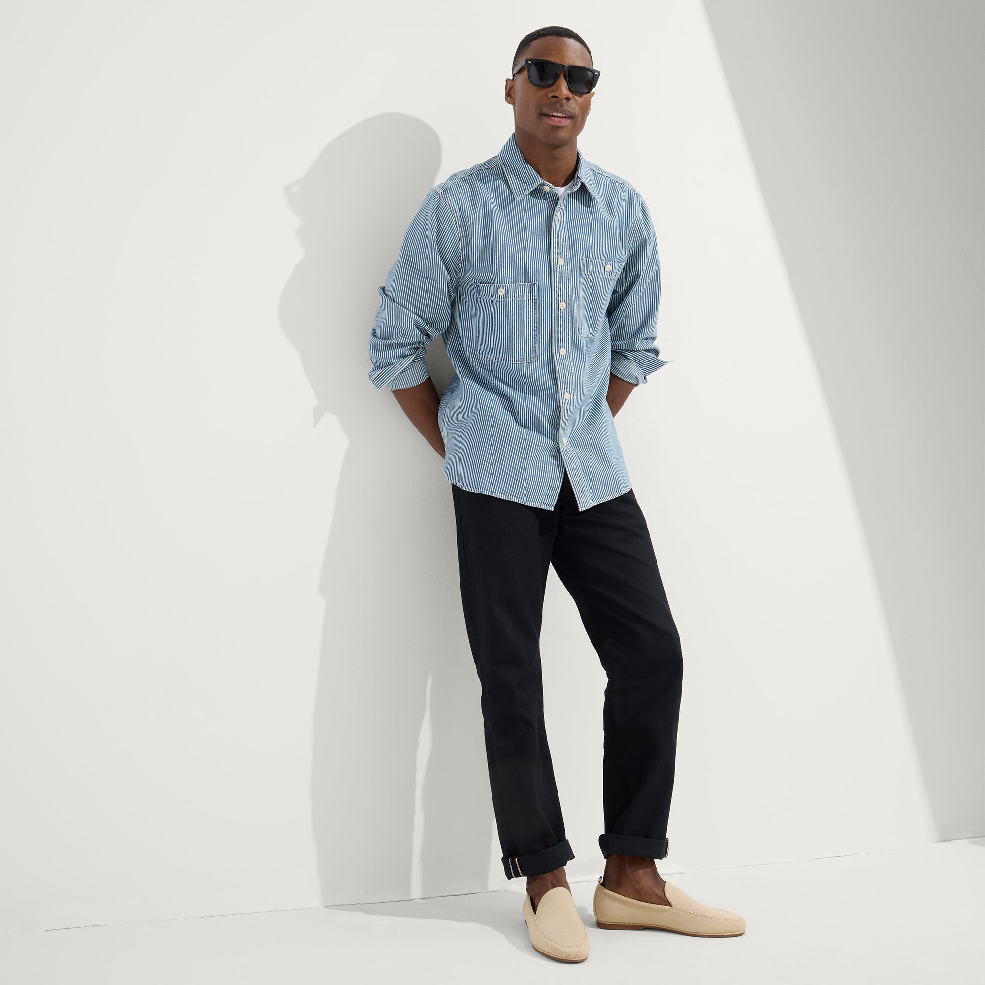 Alternate view of a model wearing The Ravello Loafer in Sand.