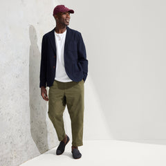 Alternate view of a model wearing The Ravello Loafer in Stone Black.