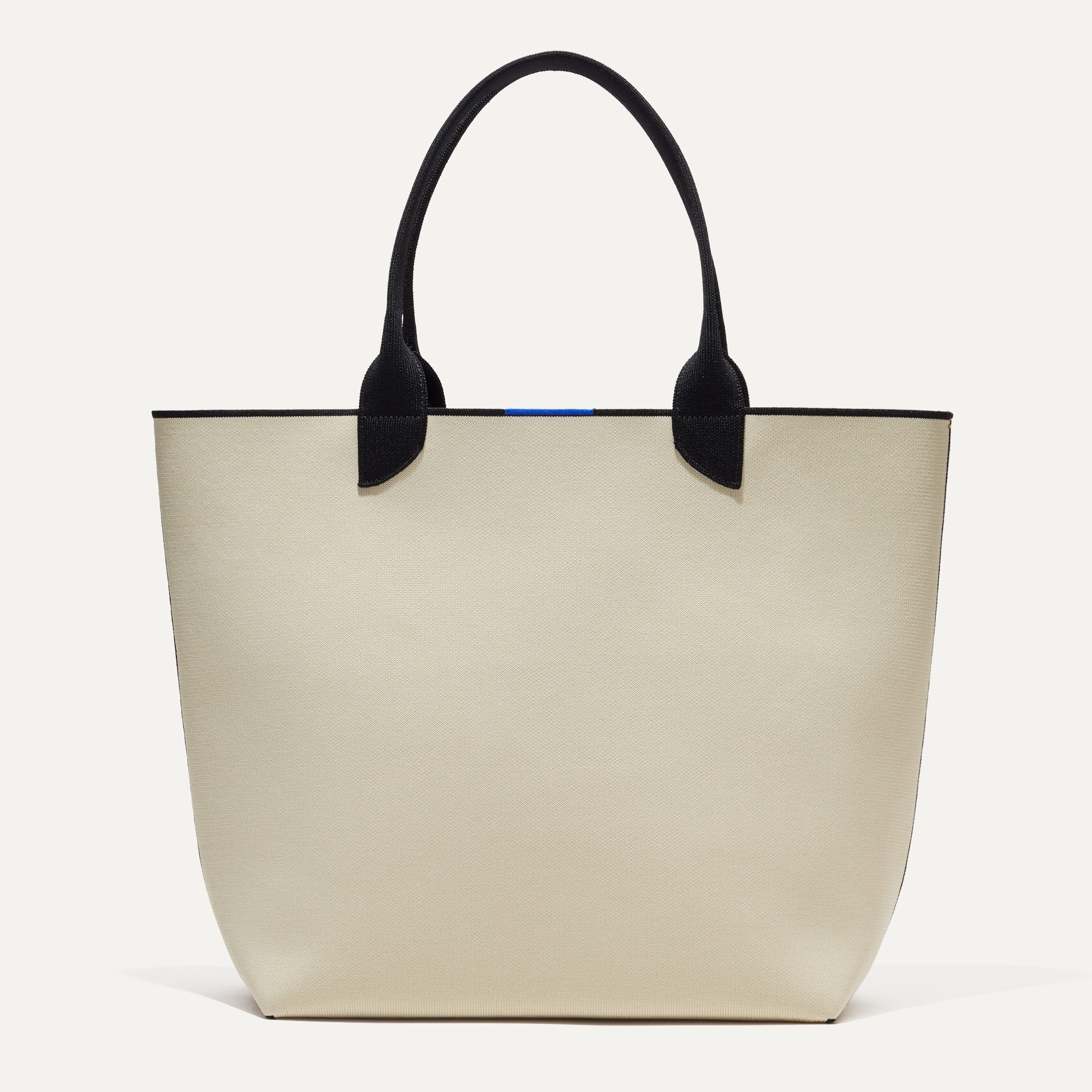 PLP |The Reversible Lightweight Tote in mist & Ivory shown from the front.