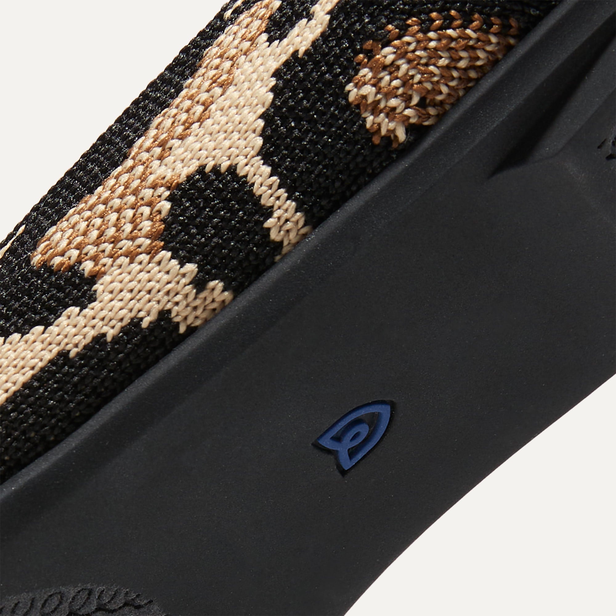 The sole of The Almond Loafer in Desert Cat shown in diagonal view.