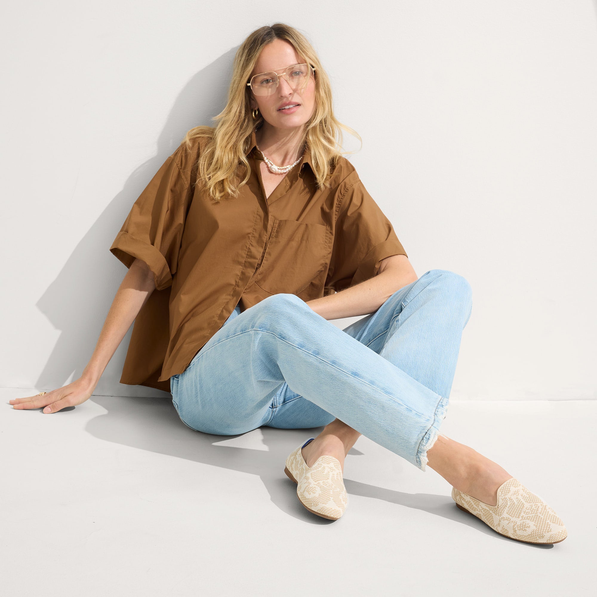 Alternate view of a model wearing The Almond Loafer in Pearl Bouquet.