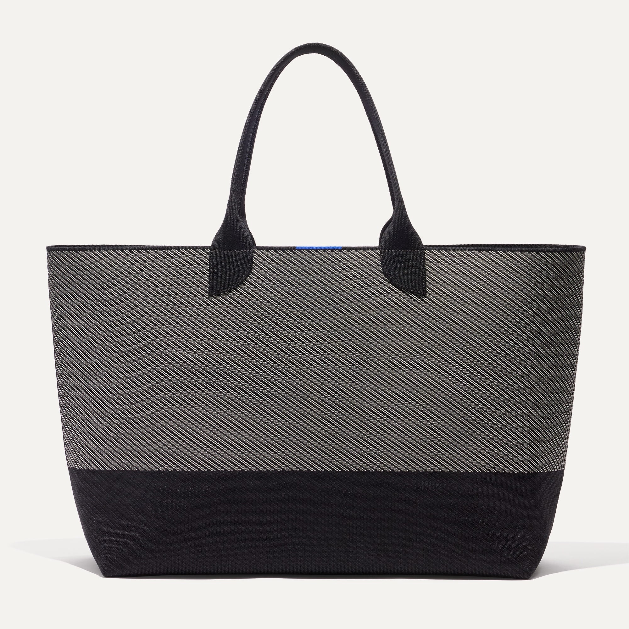 PLP |The Lightweight Mega Tote in Grey Mist Twill, shown from the from the front.