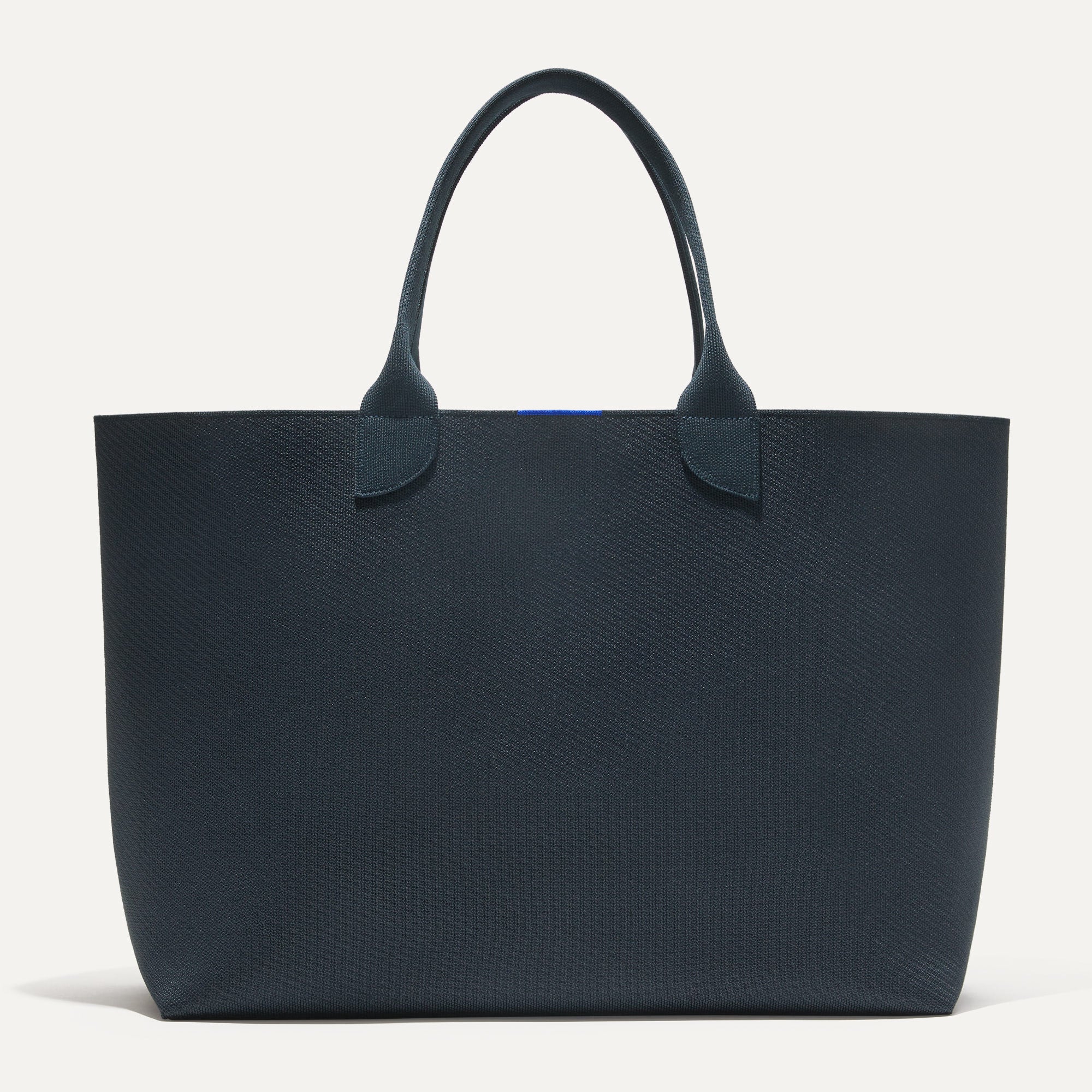 PLP |The Lightweight Mega Tote in Navy, shown from the from the front.