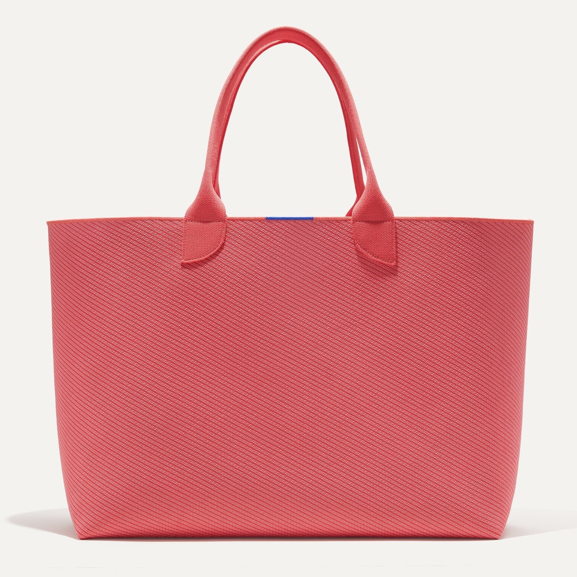 PLP |The Lightweight Mega Tote in Ruby Grapefruit Twill, shown from the from the front.