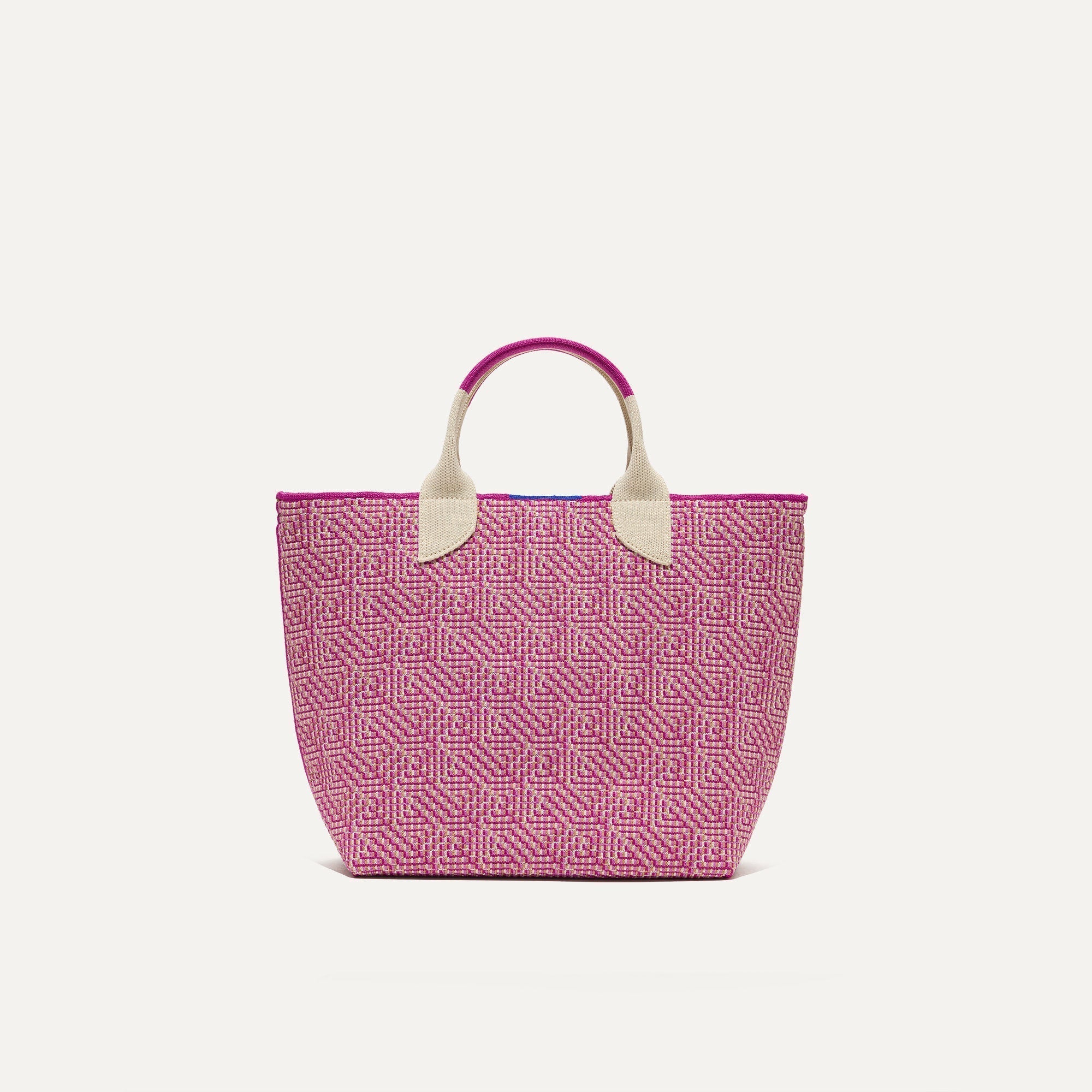 PLP |The Lightweight Petite Tote in Fuchsia Geo, shown from the front.