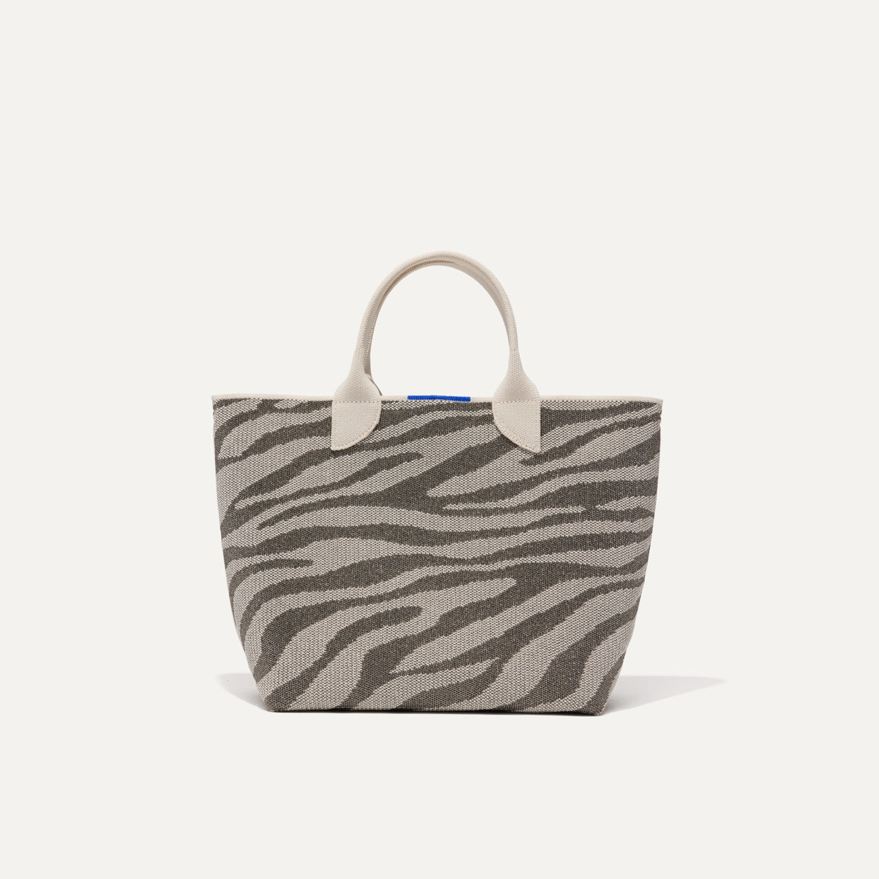 PLP |The Lightweight Petite Tote in Shimmer Zebra, shown from the front.