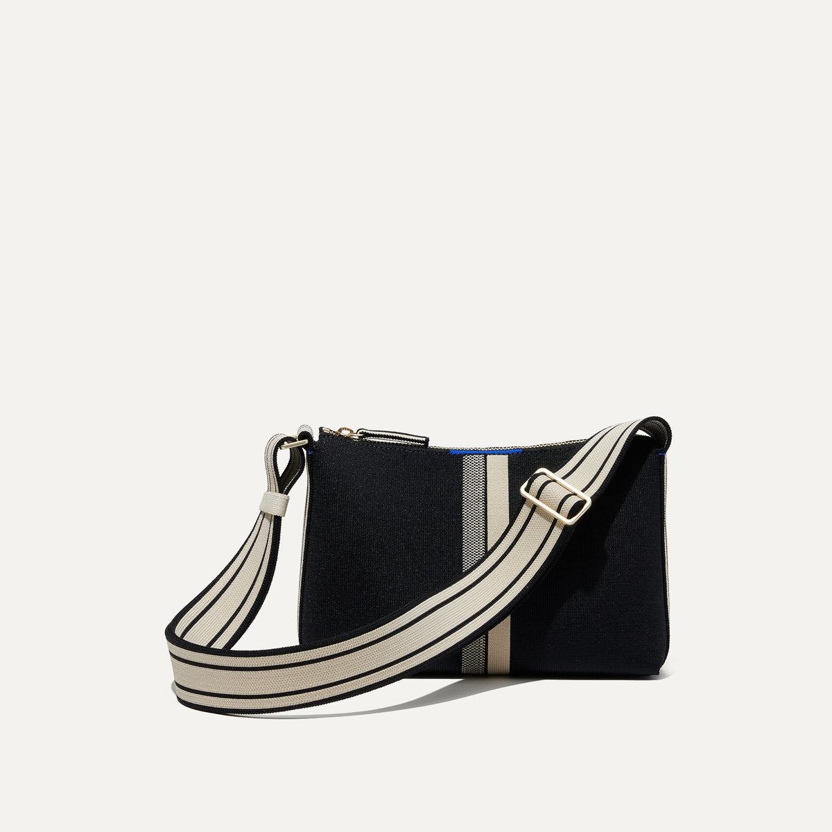 PLP |The Casual Crossbody in Black & Ivory Stripe, shown from the front.