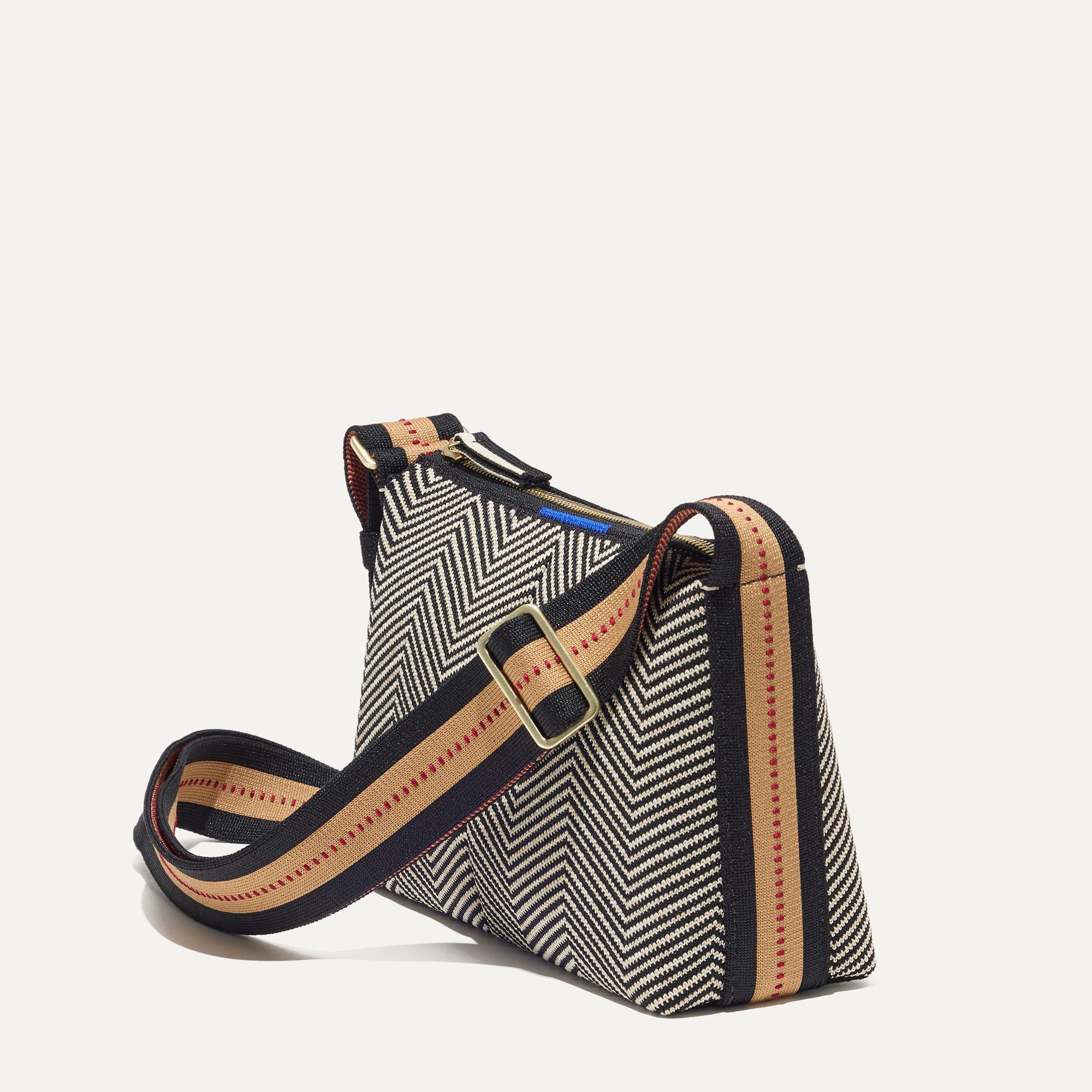 The Casual Crossbody in Dark Mist, shown from the side at an angle.