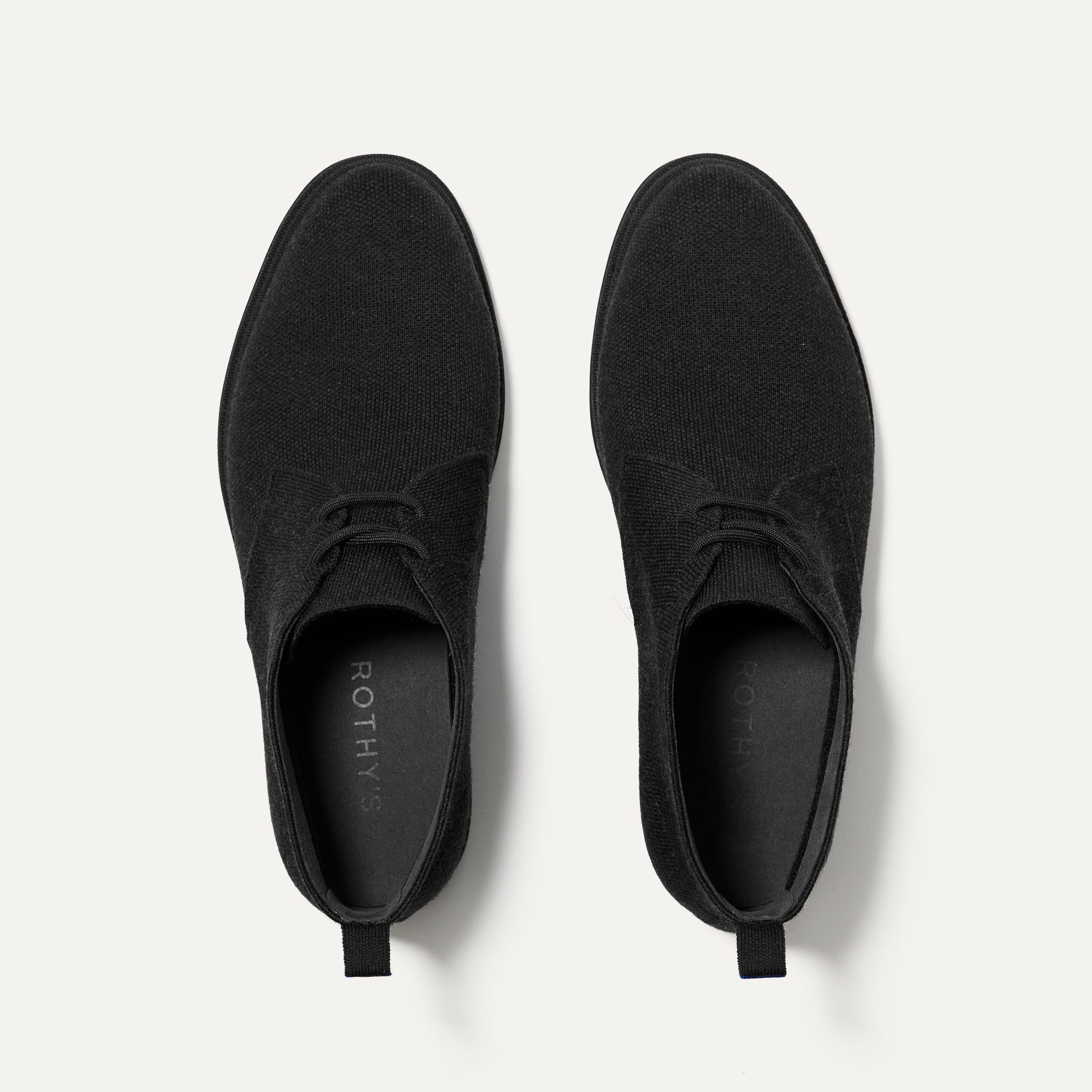 A pair of The Chukka Boot in Black shown from the top.