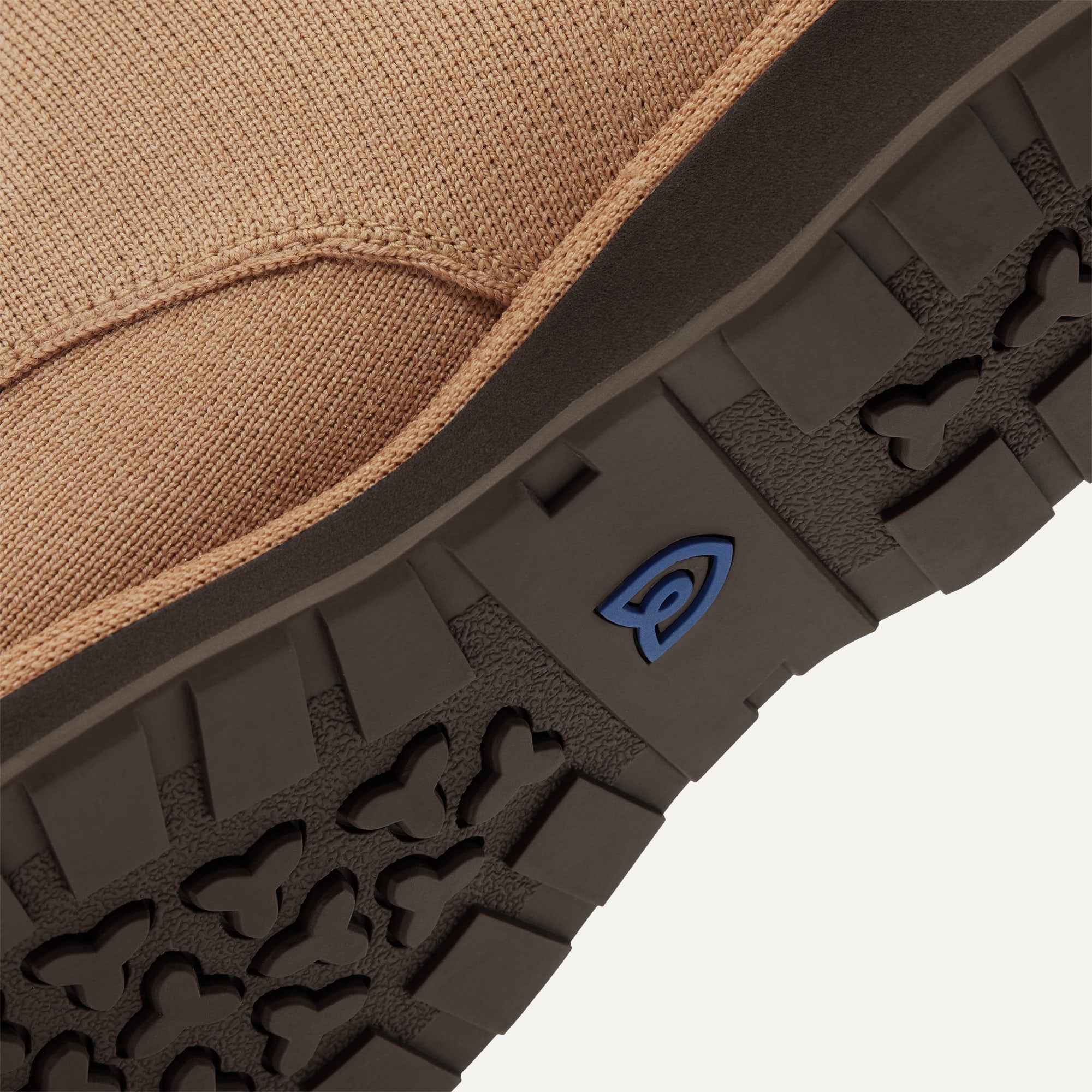 Close up of the outsoles of The Chukka Boot in Butternut, with raised grooves for added traction. 
