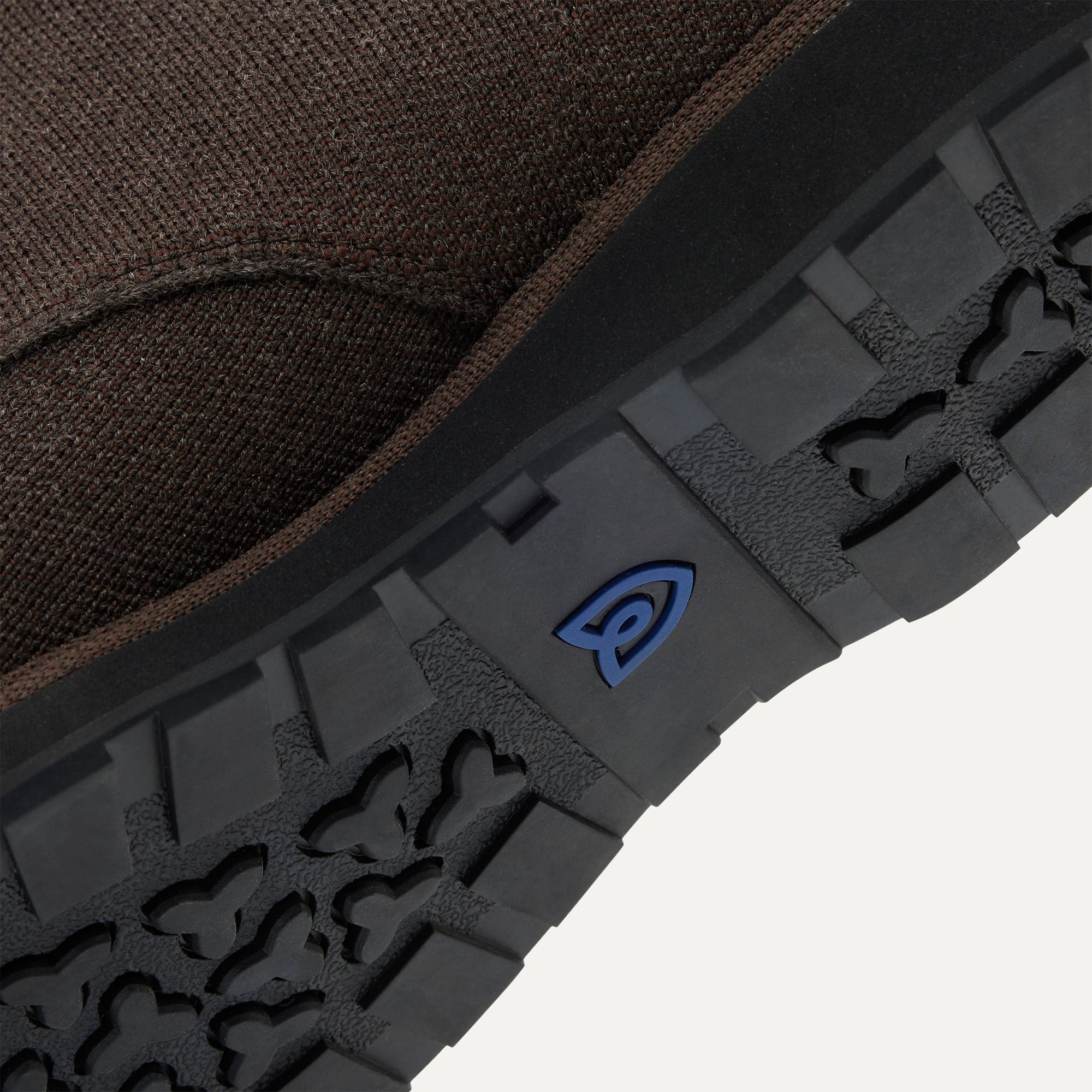 Close up of the outsoles of The Chukka Boot in Umber, with raised grooves for added traction. 