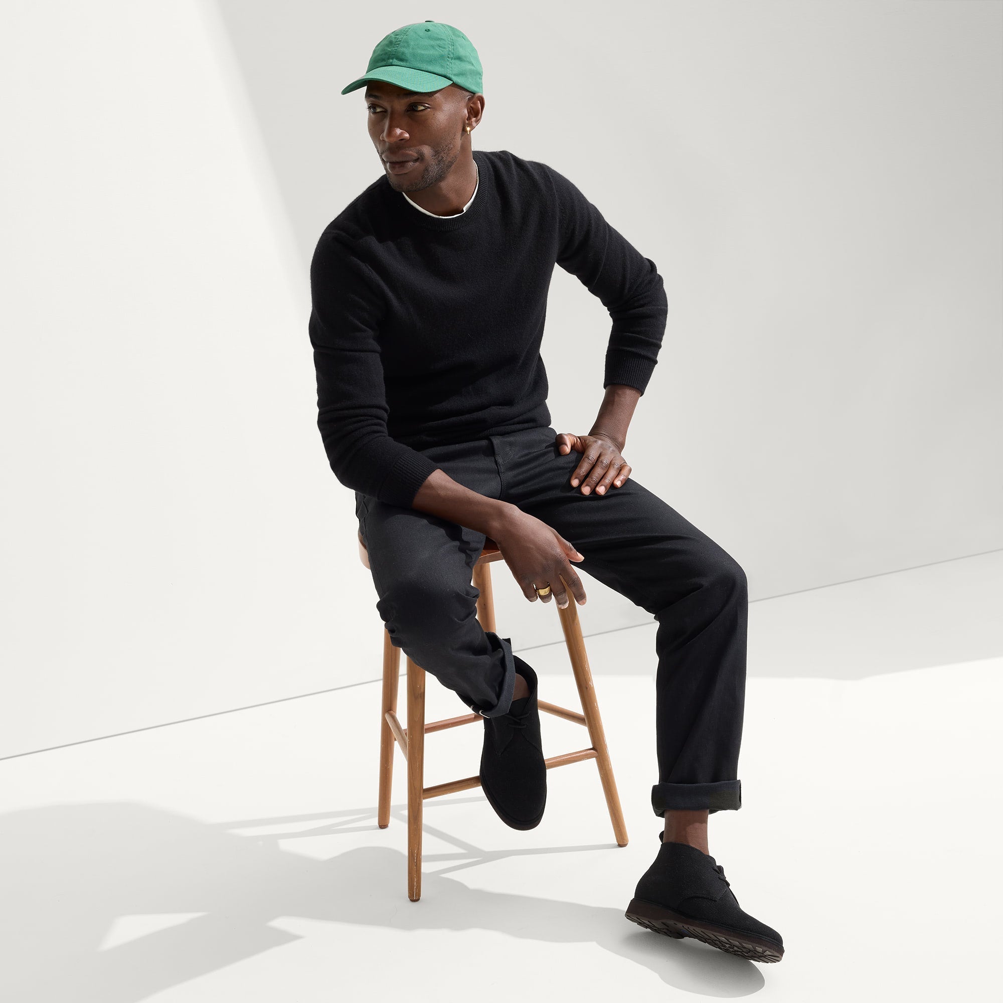 Alternate view of a model wearing The Chukka Boot in Black.