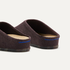 Close up of the heel of The Casual Clog in Chestnut, with Rothy's signature blue halo.