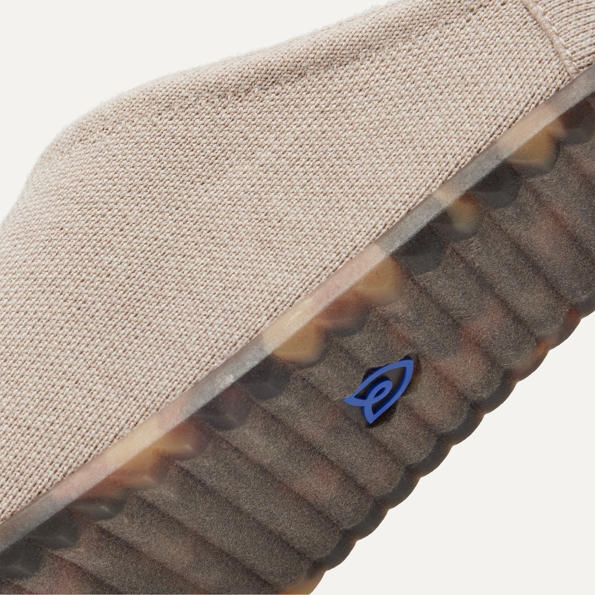 Close up of the outsoles of The Casual Clog in Dove.