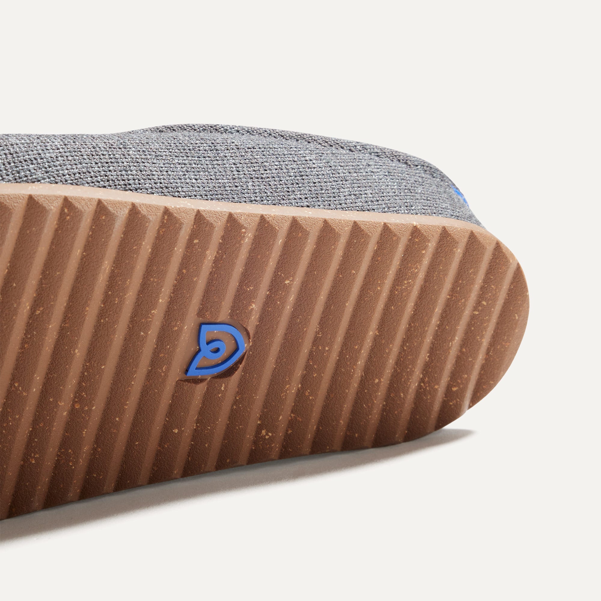 Close up of the outsoles of The Casual Clog in Mountain Grey.