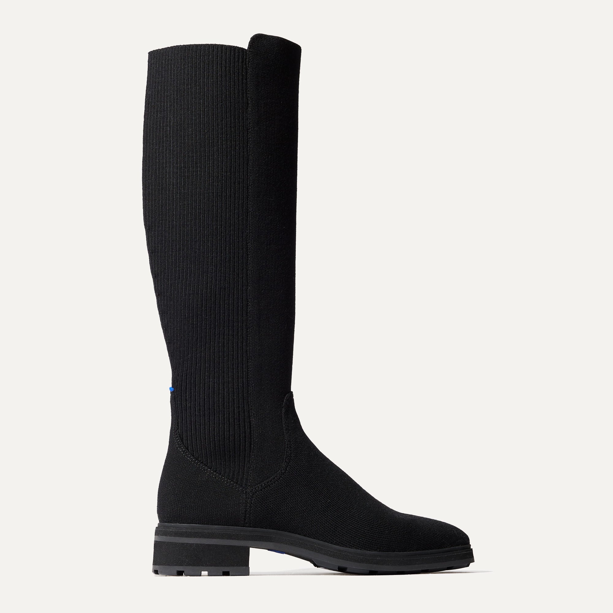 The Tall Lug Boot in Onyx Black shown from the side.