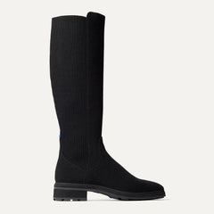 The Tall Lug Boot in Onyx Black shown from the side.