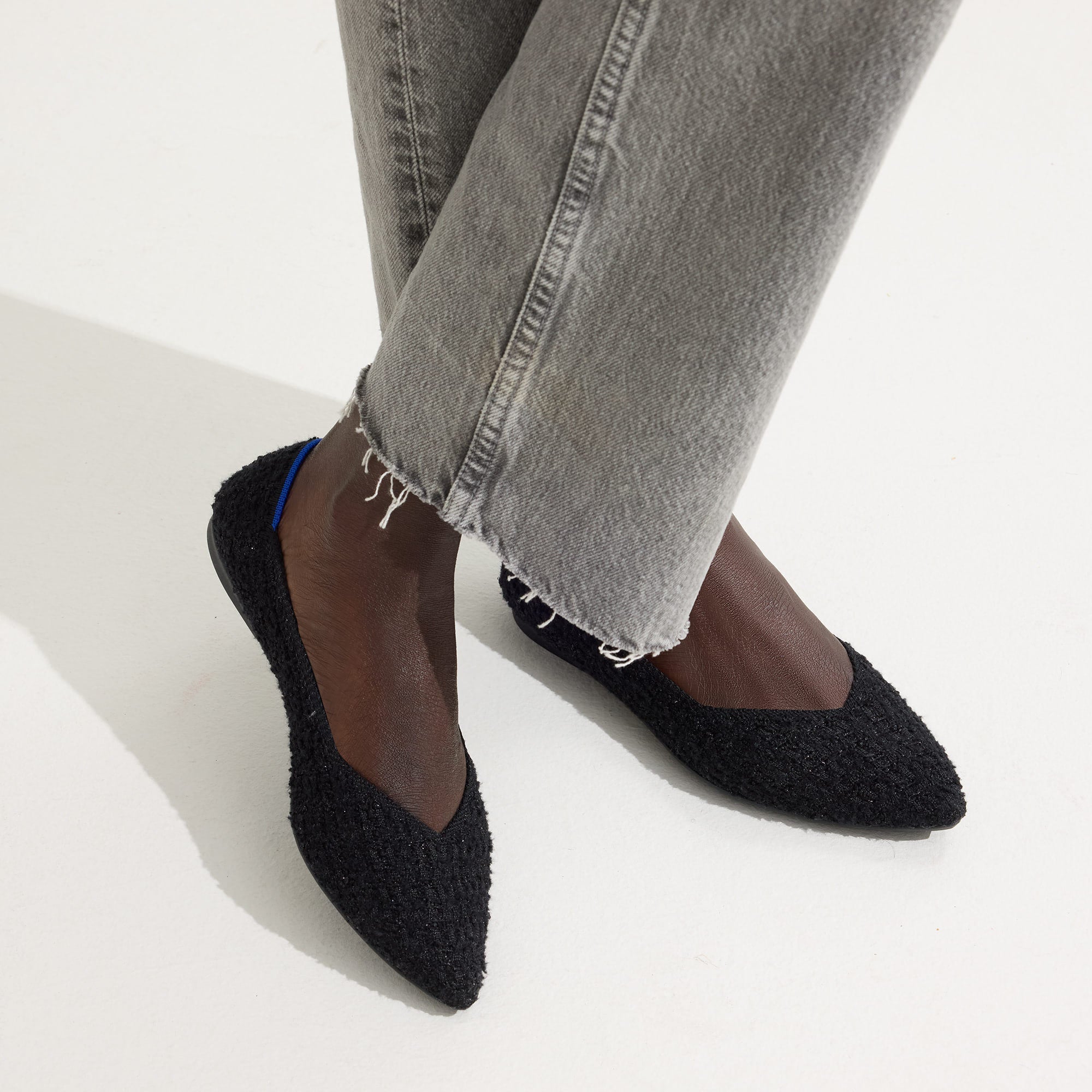 hover | Model wearing The Point II in Black Boucle.