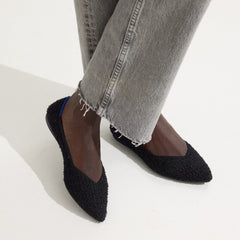 hover | Model wearing The Point II in Black Boucle.