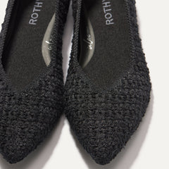 Close up of the toe and vamp on The Point II in Black Bouclé.