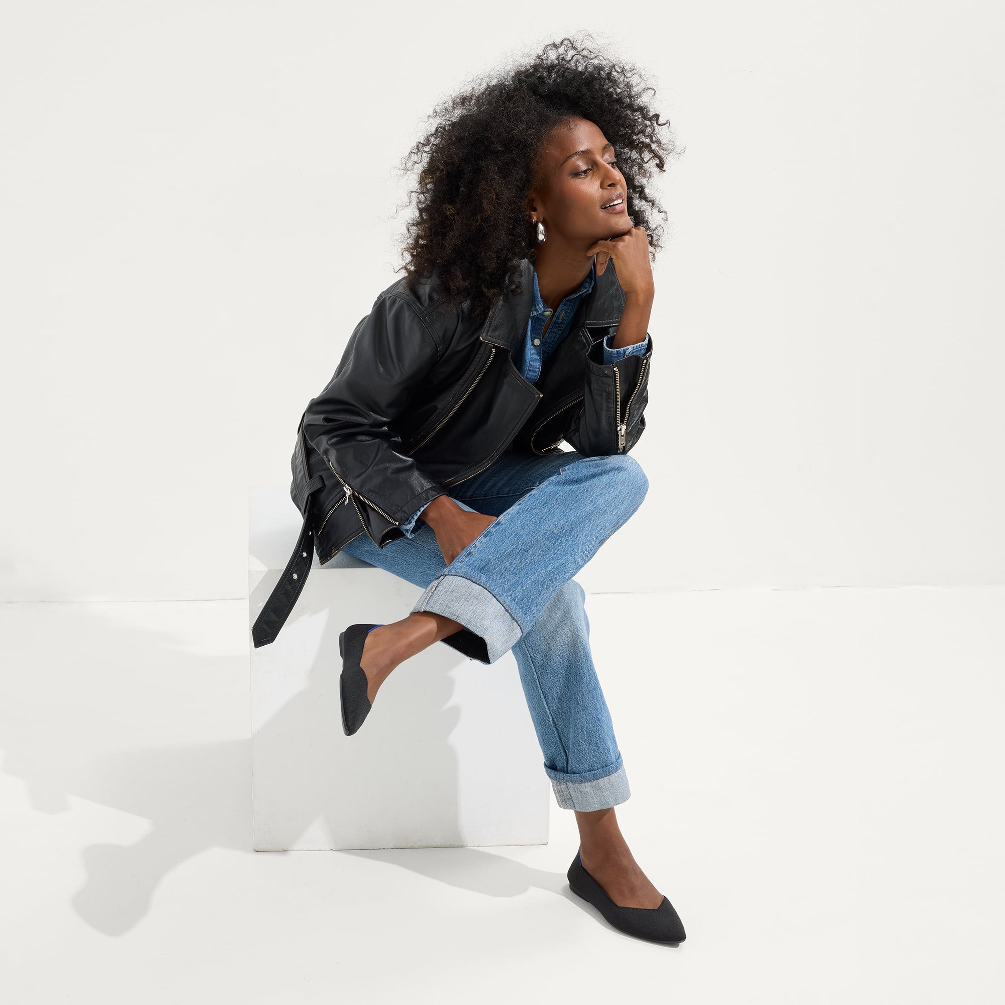 Alternate view of a model wearing The Point II in Black.