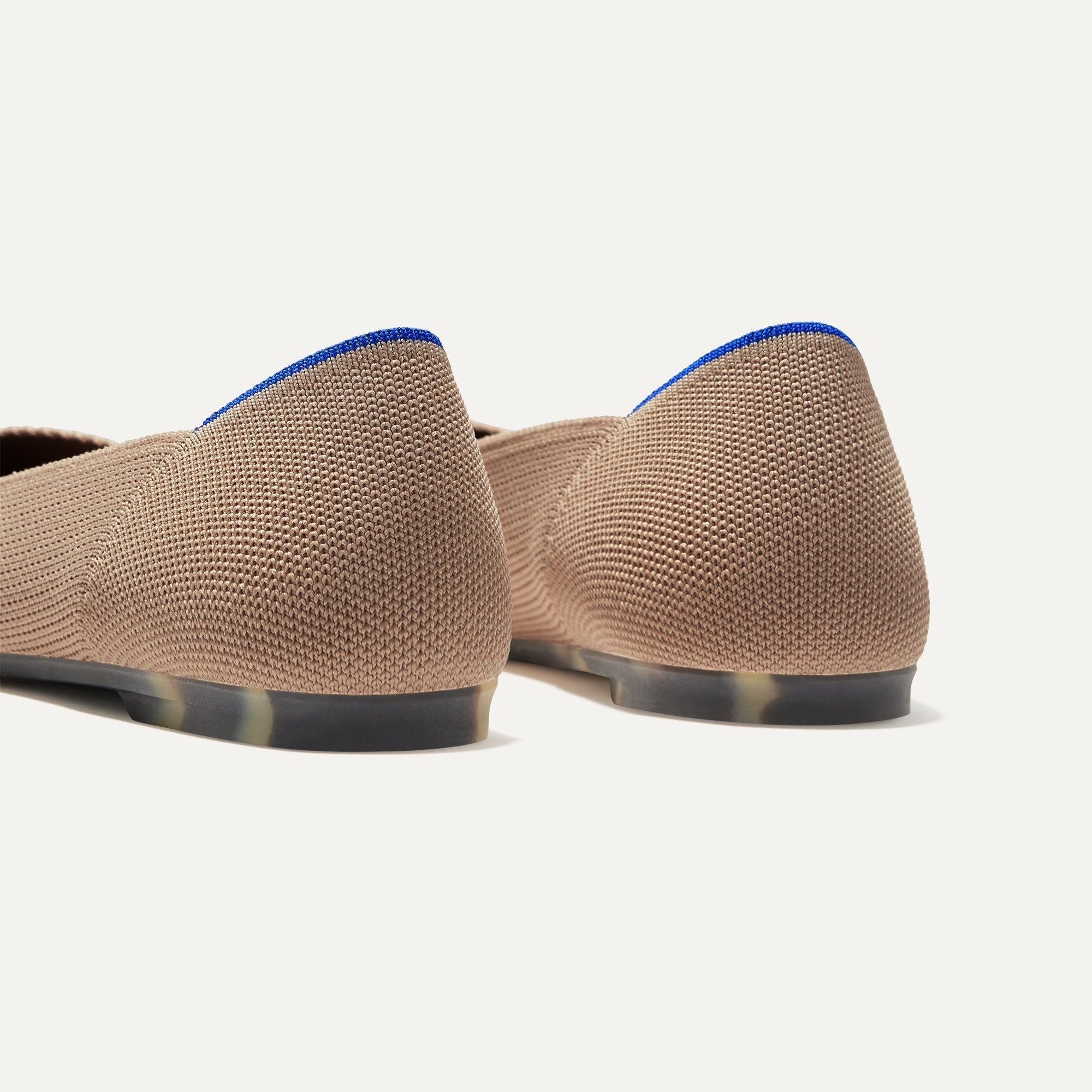 Close up of the heel of The Point II in Portobello, with Rothy's signature blue halo.