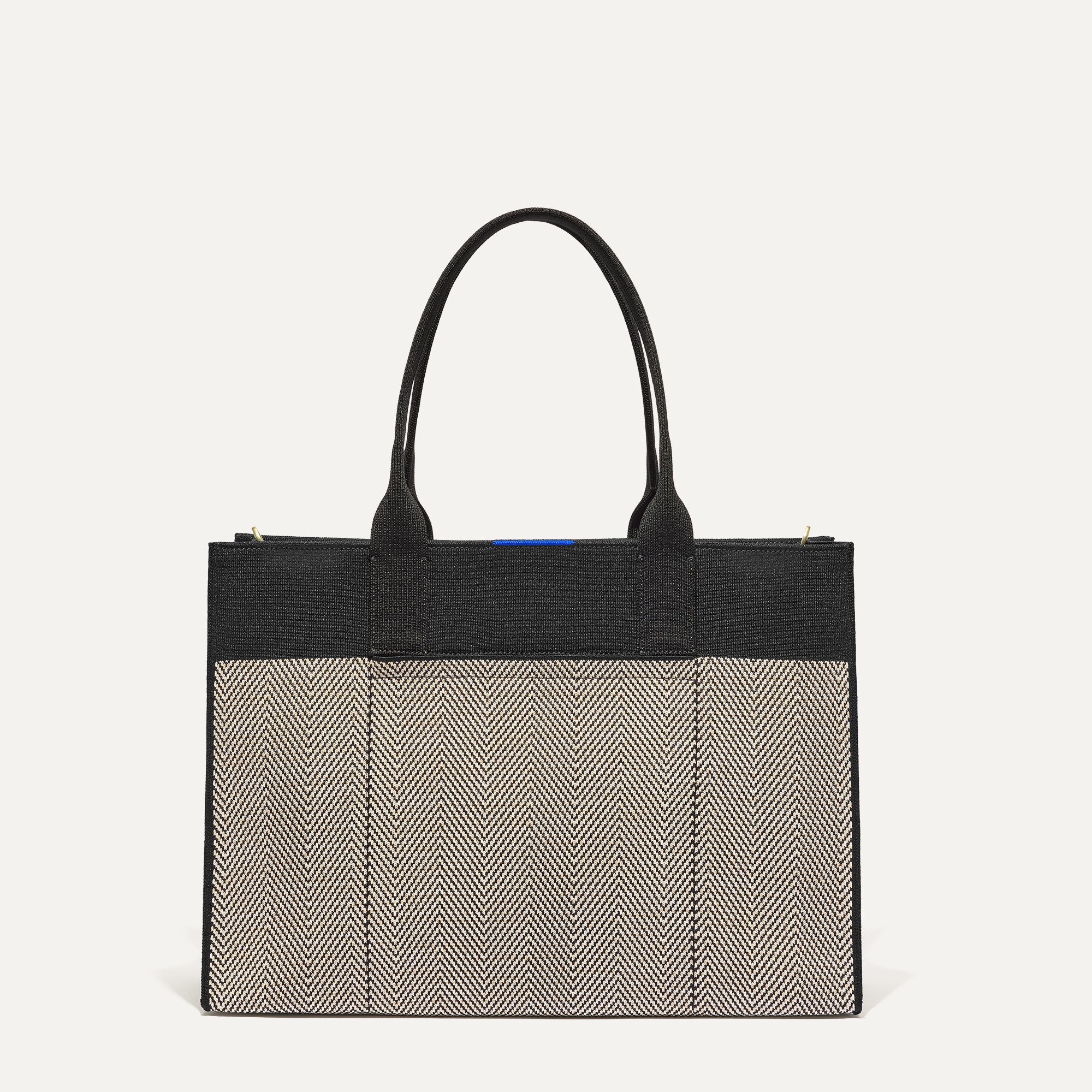 PLP |The Classic Tote in Black Herringbone, shown from the front. 