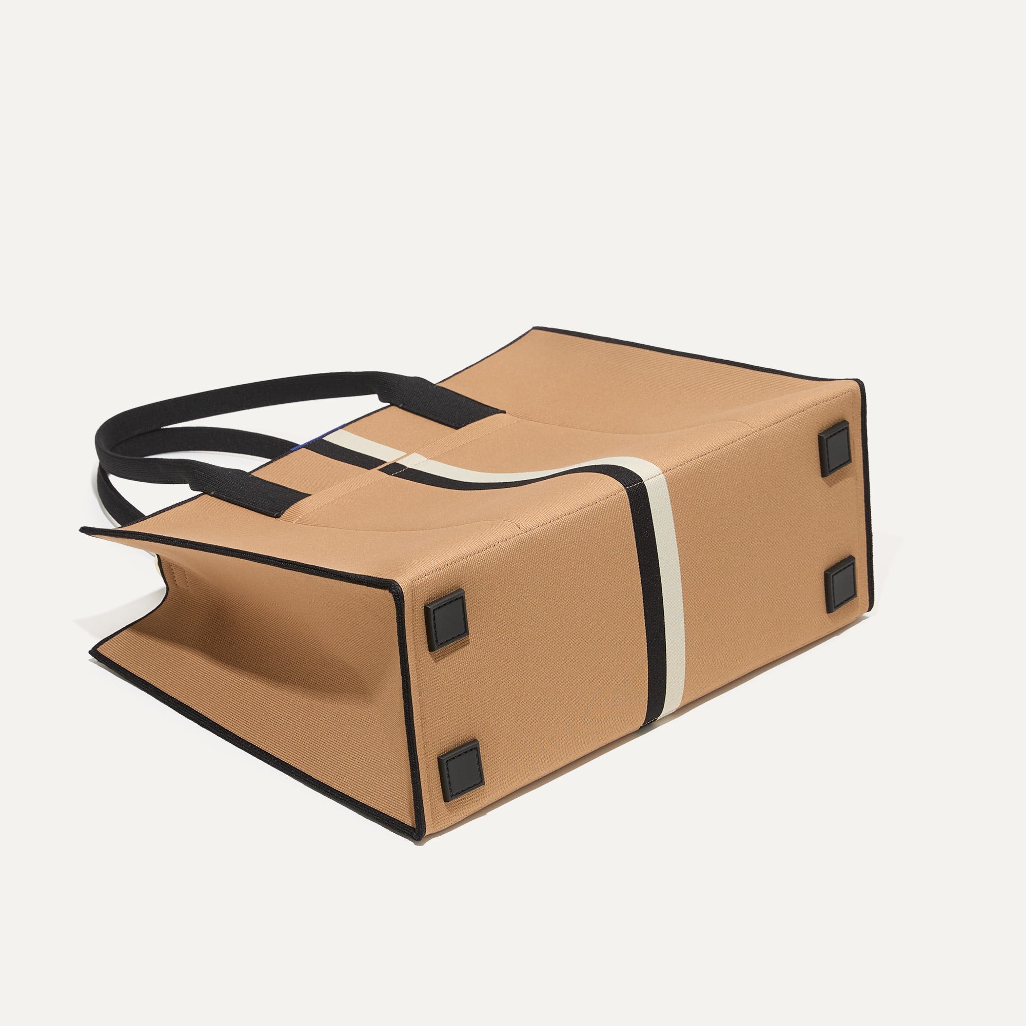 The Classic Tote in Grand Piano, shown from the bottom. 